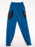 Under Armour blue HeatGear joggers with black accents and zippered cargo pockets.