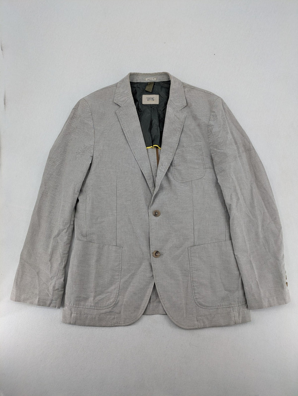 Camel Active grey cord blazer with classic two-button closure and practical zippered inner pockets.