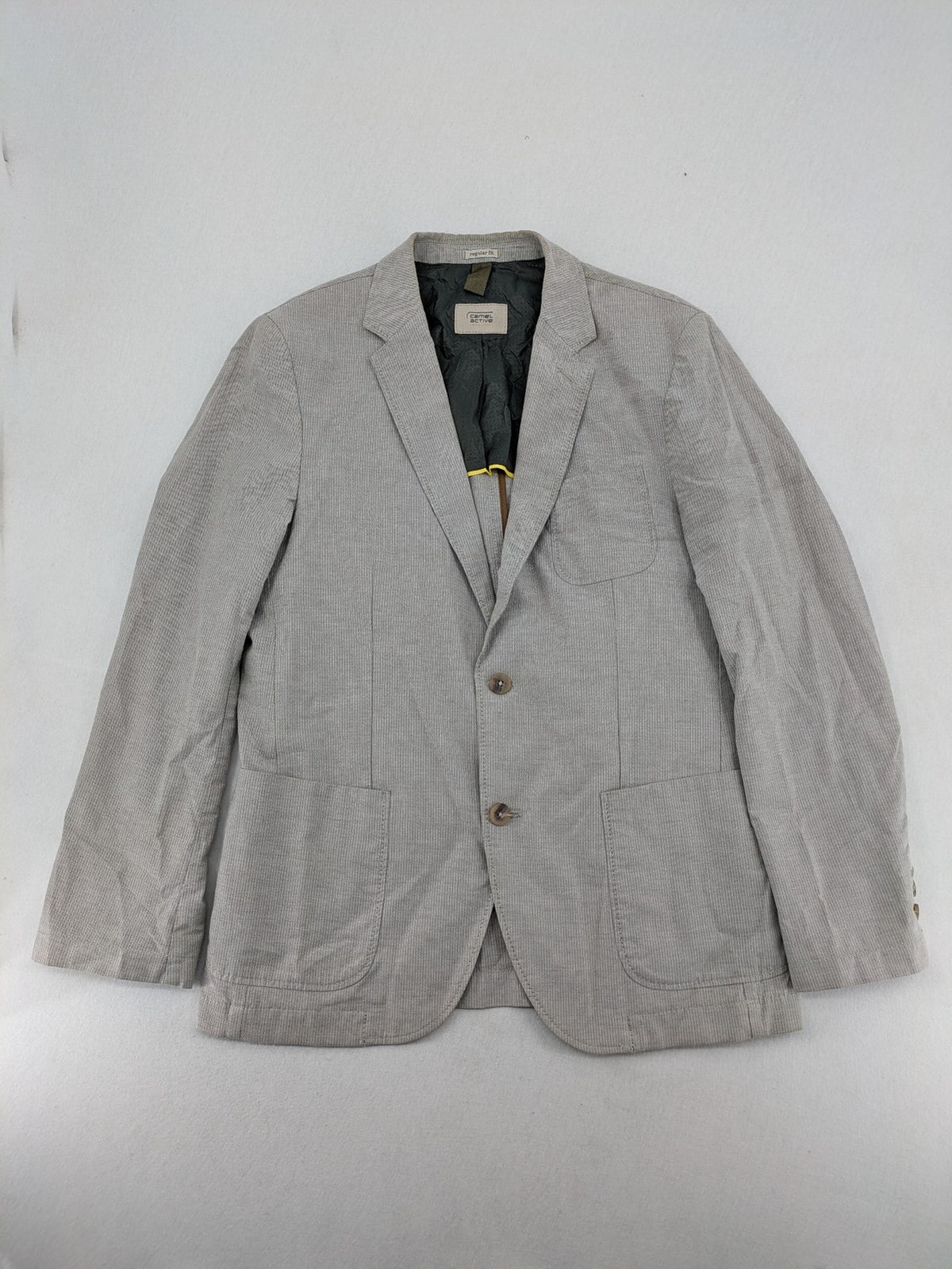 Camel Active grey cord blazer with classic two-button closure and practical zippered inner pockets.
