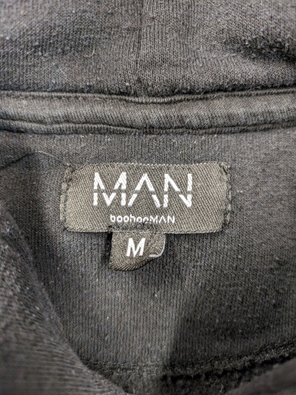 Boohooman zip-through hoodie black with floral graphic and "Limited Edition Collection" text.