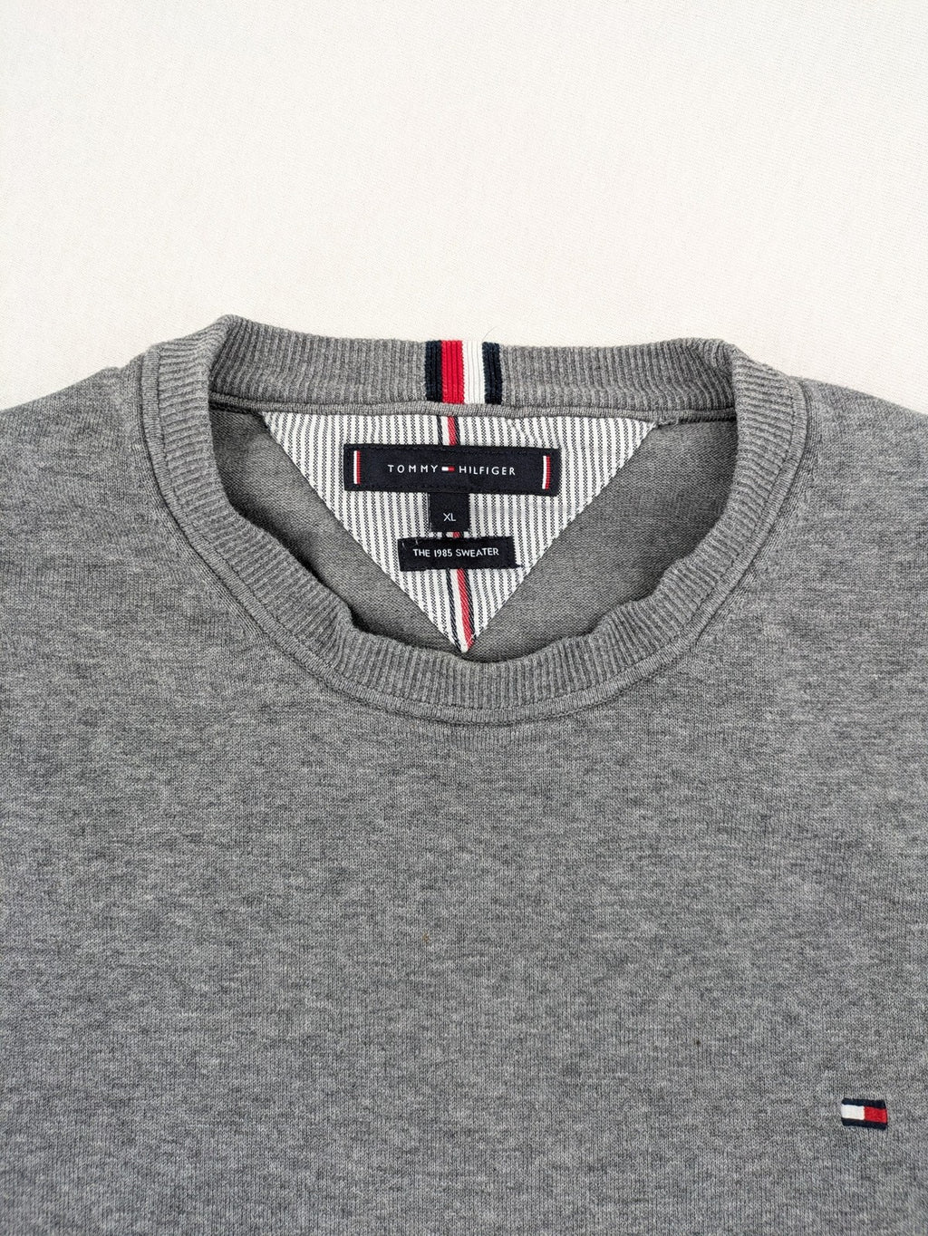 Tommy Hilfiger grey turtle neck jumper with embroidered flag logo, soft cotton blend.