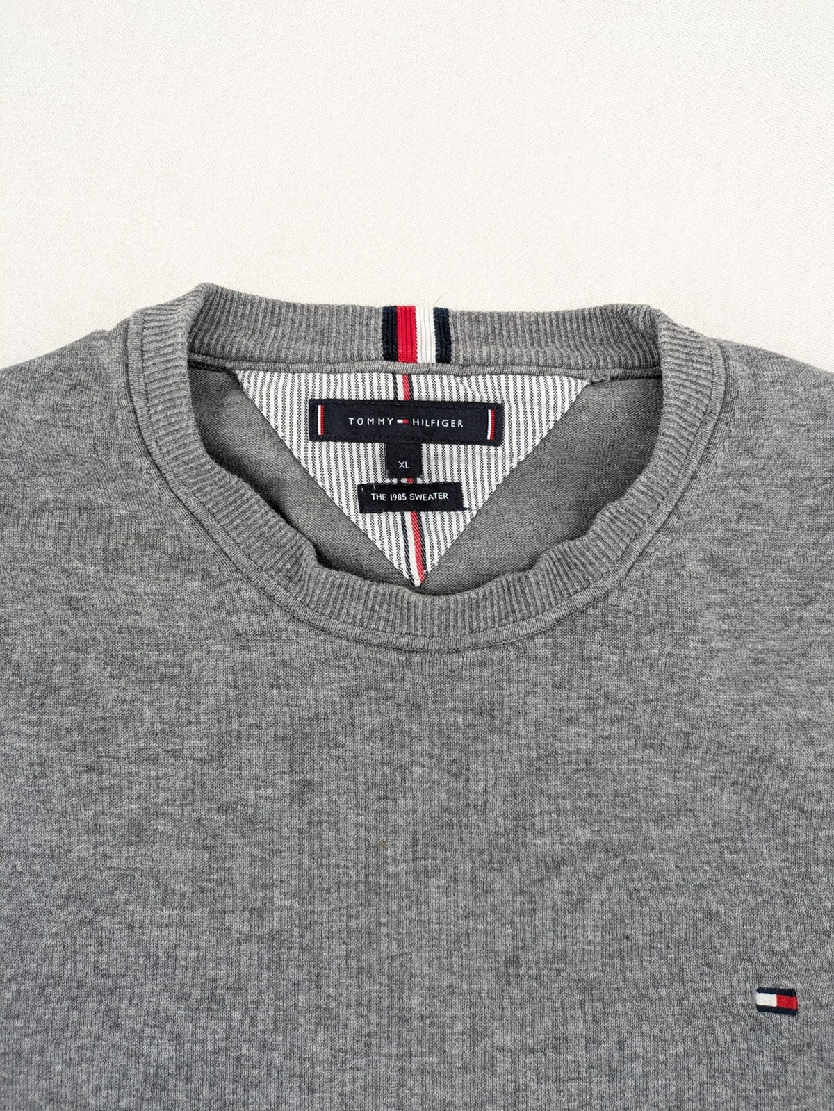 Tommy Hilfiger grey turtle neck jumper with embroidered flag logo, soft cotton blend.