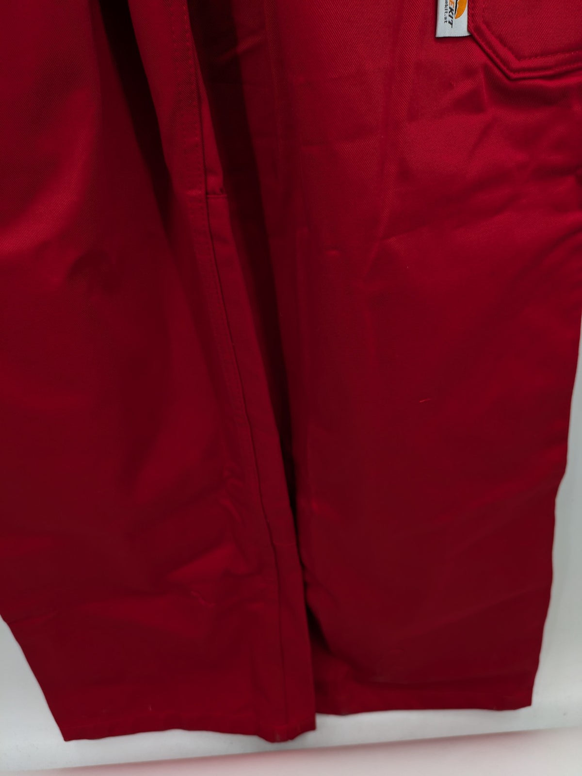 Stonekit red work overalls cotton with adjustable straps and multiple cargo pockets.