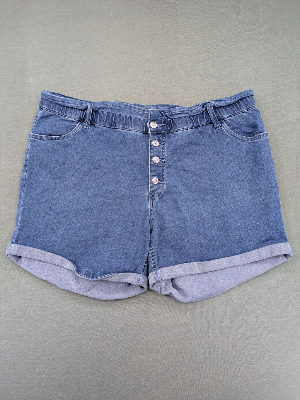 Bodyflirt blue high waist paperbag jeans shorts with button fly and rolled cuffs.