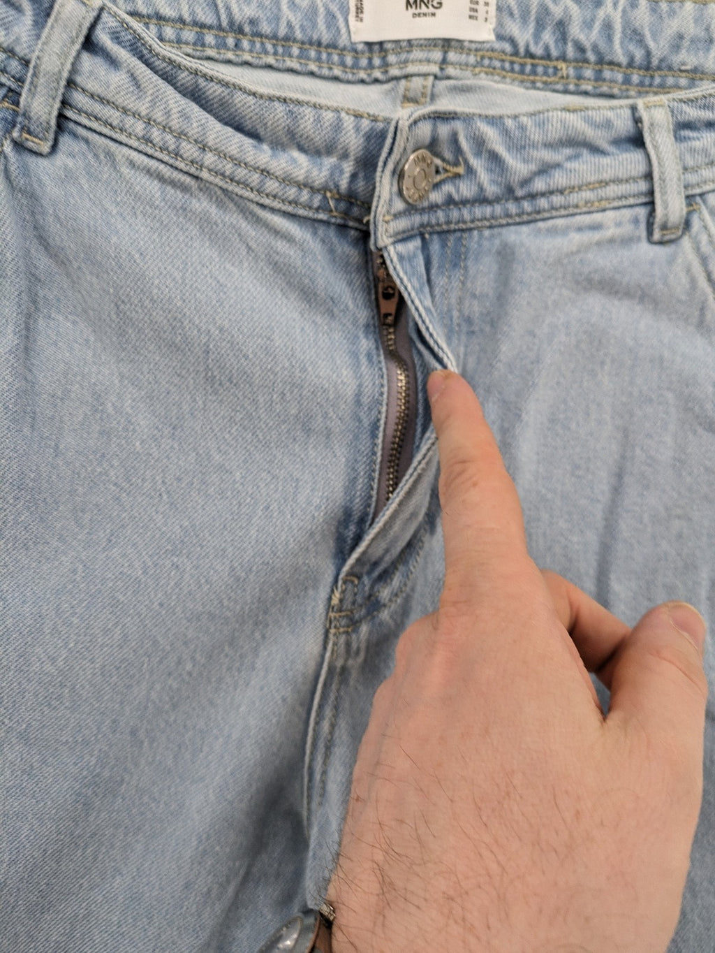 MNG blue straight jeans with cargo pockets and raw hem, high waist denim.