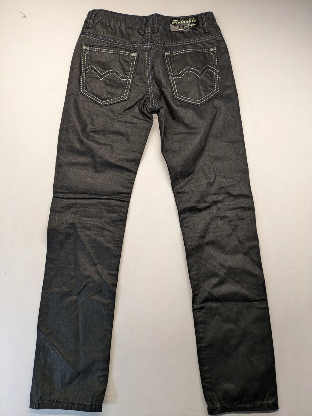 Fadnoble grey straight jeans with button fly and contrasting stitching details.