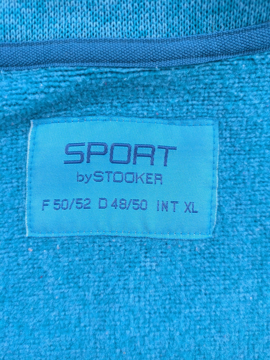 Stooker blue and turquoise fleece jacket with full zip and stand-up collar.