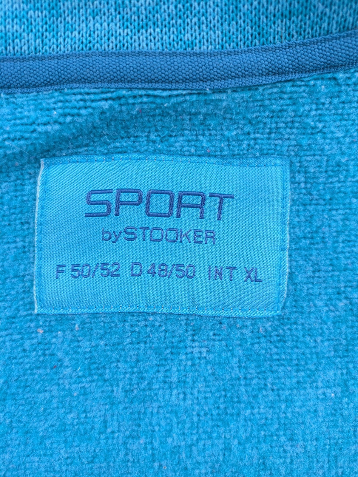 Stooker blue and turquoise fleece jacket with full zip and stand-up collar.
