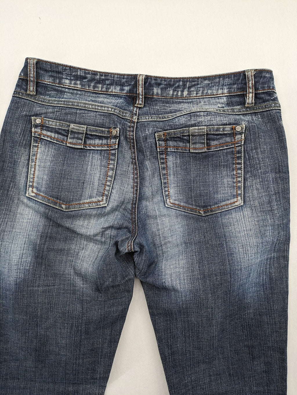 BLU blue straight jeans with washed effect, rolled hem, and five-pocket design.