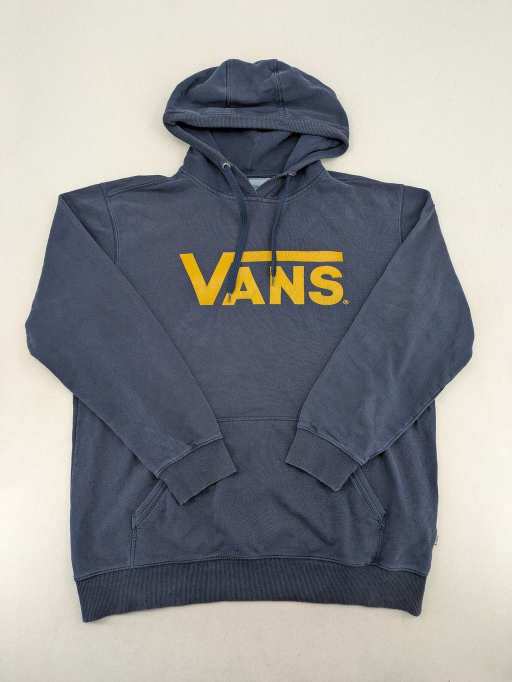Vans zip-through hoodie navy blue with large yellow logo and kangaroo pocket.