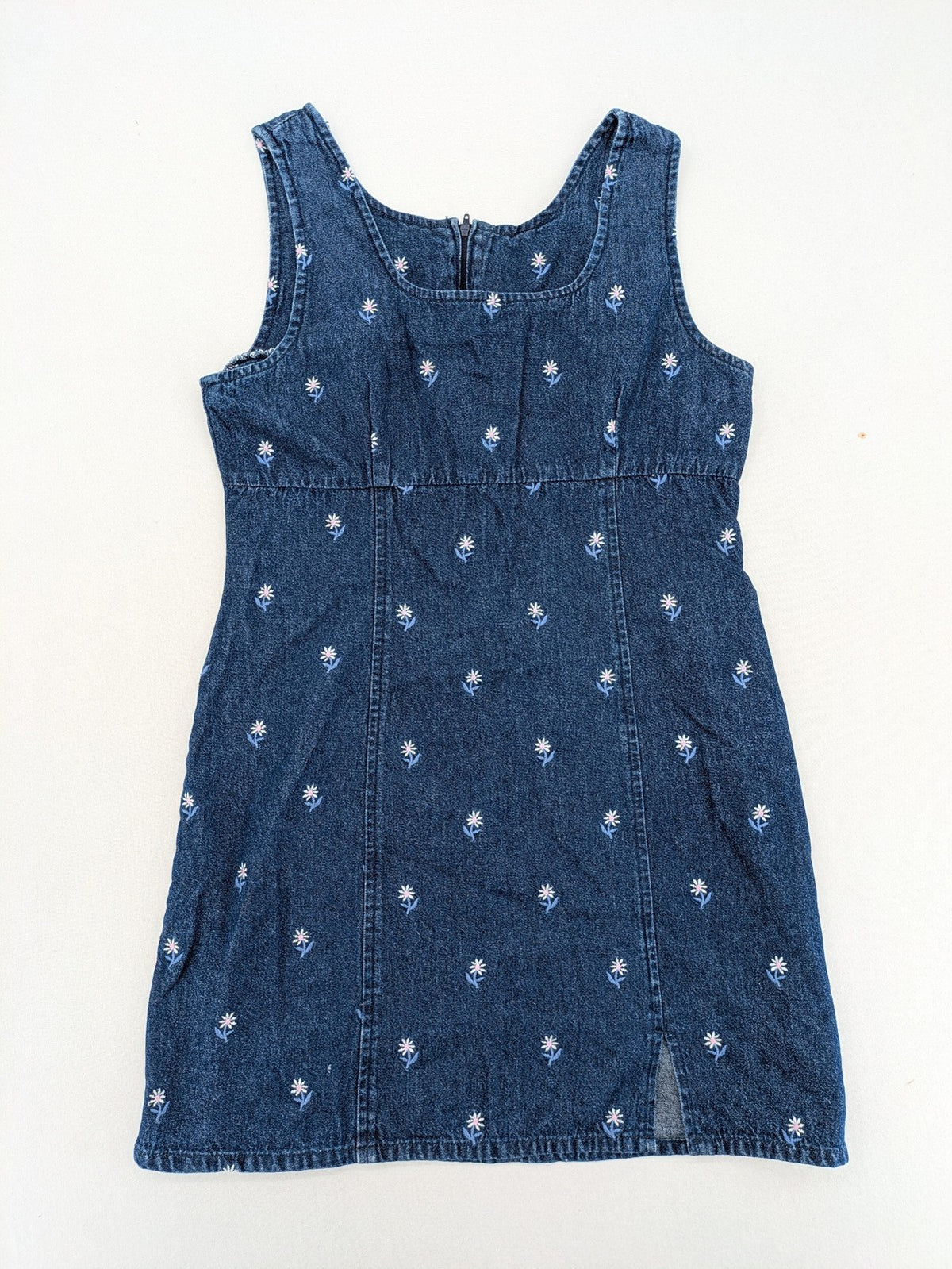 Damen blue denim mini dress with all-over white and light blue floral embroidery.