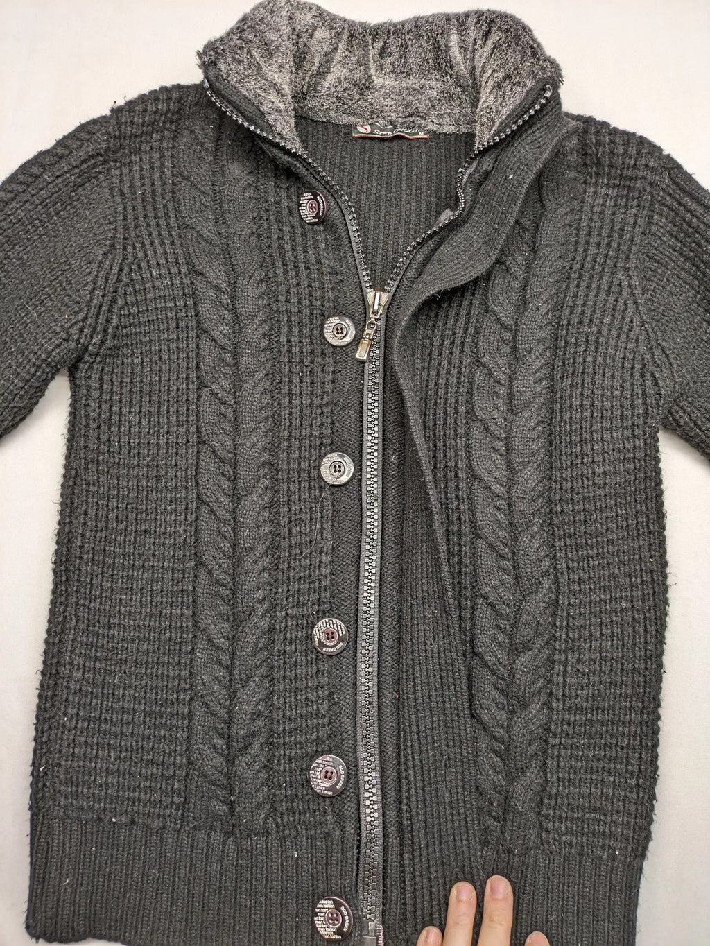 SCD Green grey turtle neck jumper with cable knit pattern and dual closure.