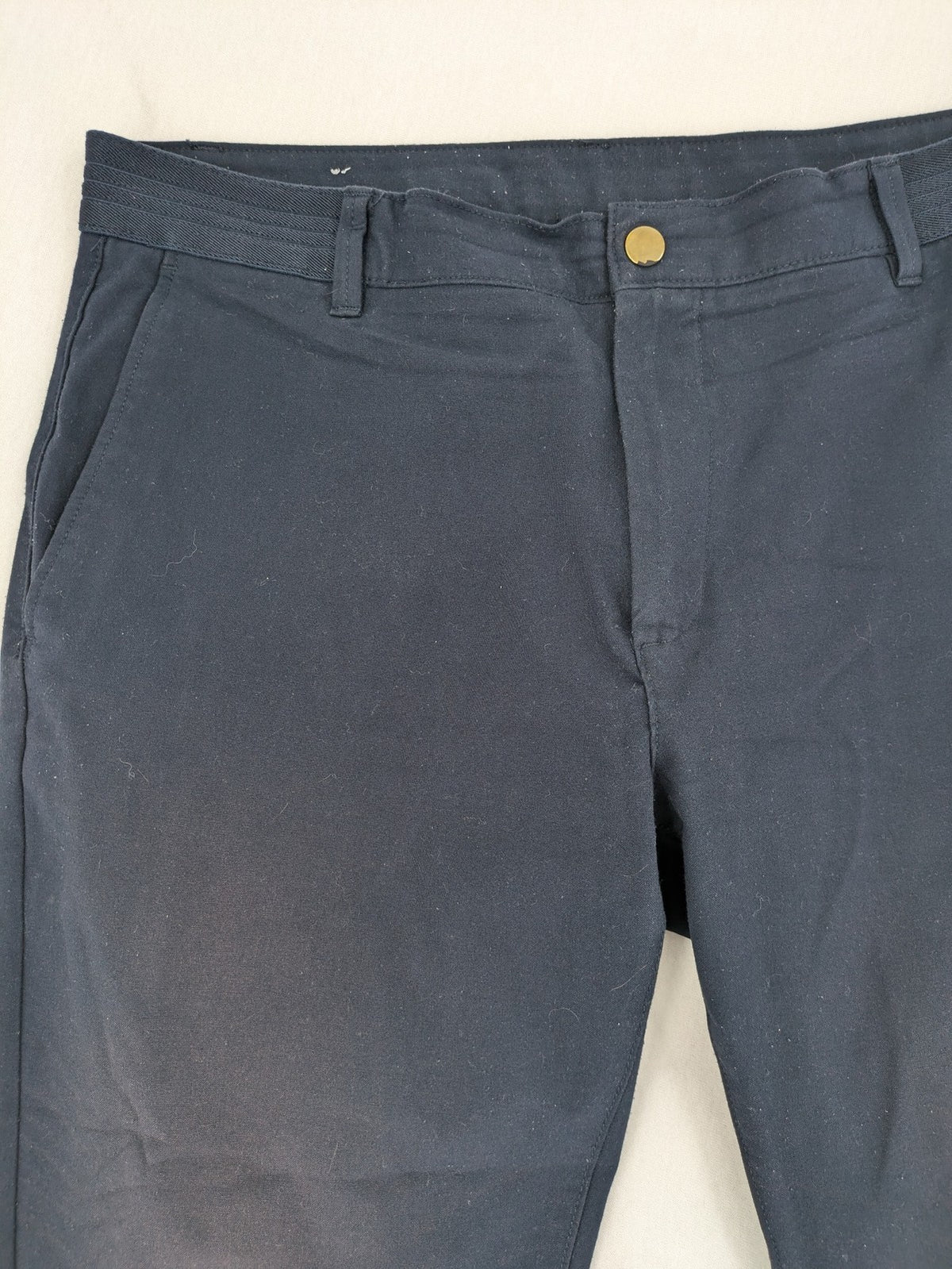 Zara navy chinos flat front design with stretch fabric for comfort and versatility.