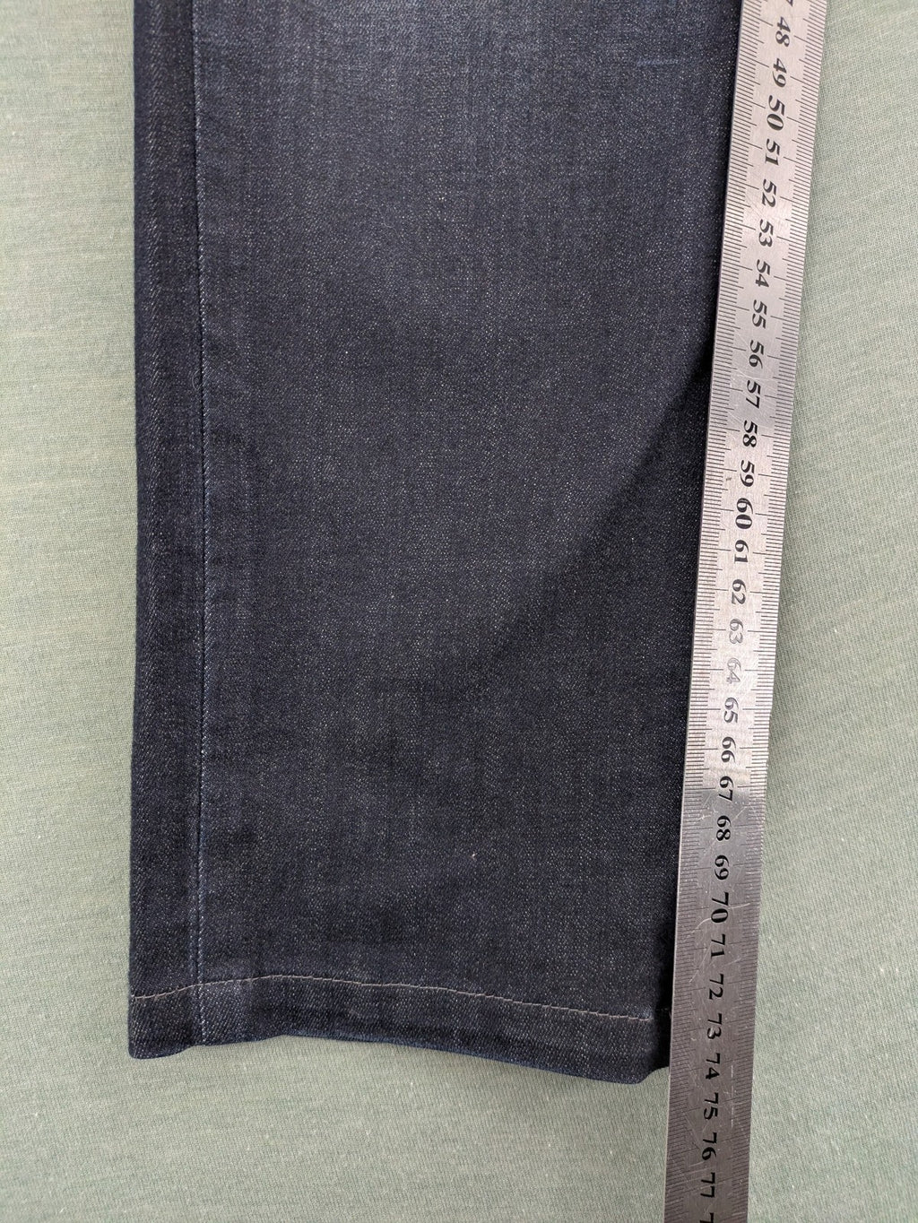Mac Jeans blue straight jeans dark wash with subtle fading and stretch denim material.