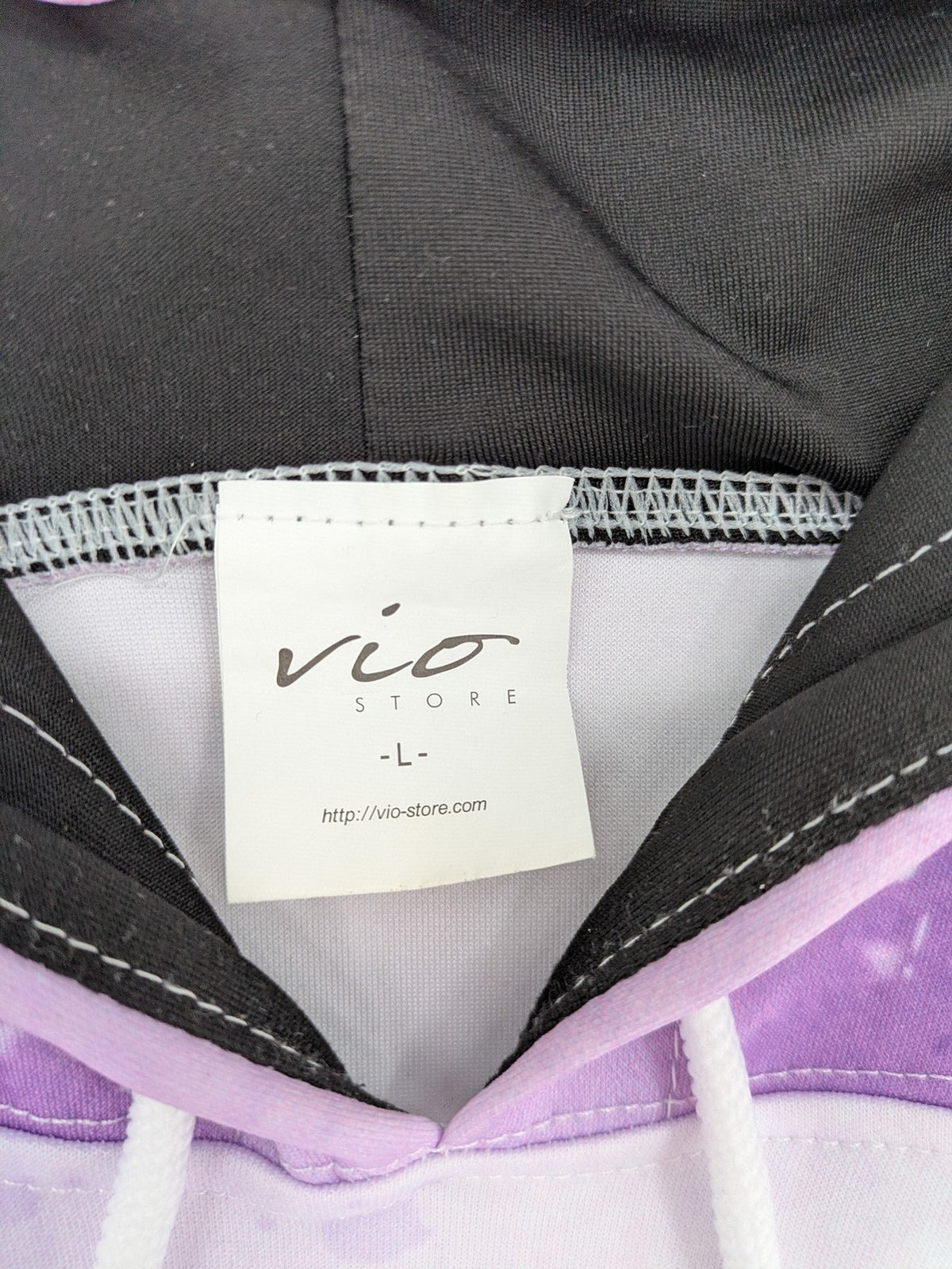 Lila zip-through hoodie multi-coloured featuring No Face graphic, front kangaroo pocket, drawstring hood.