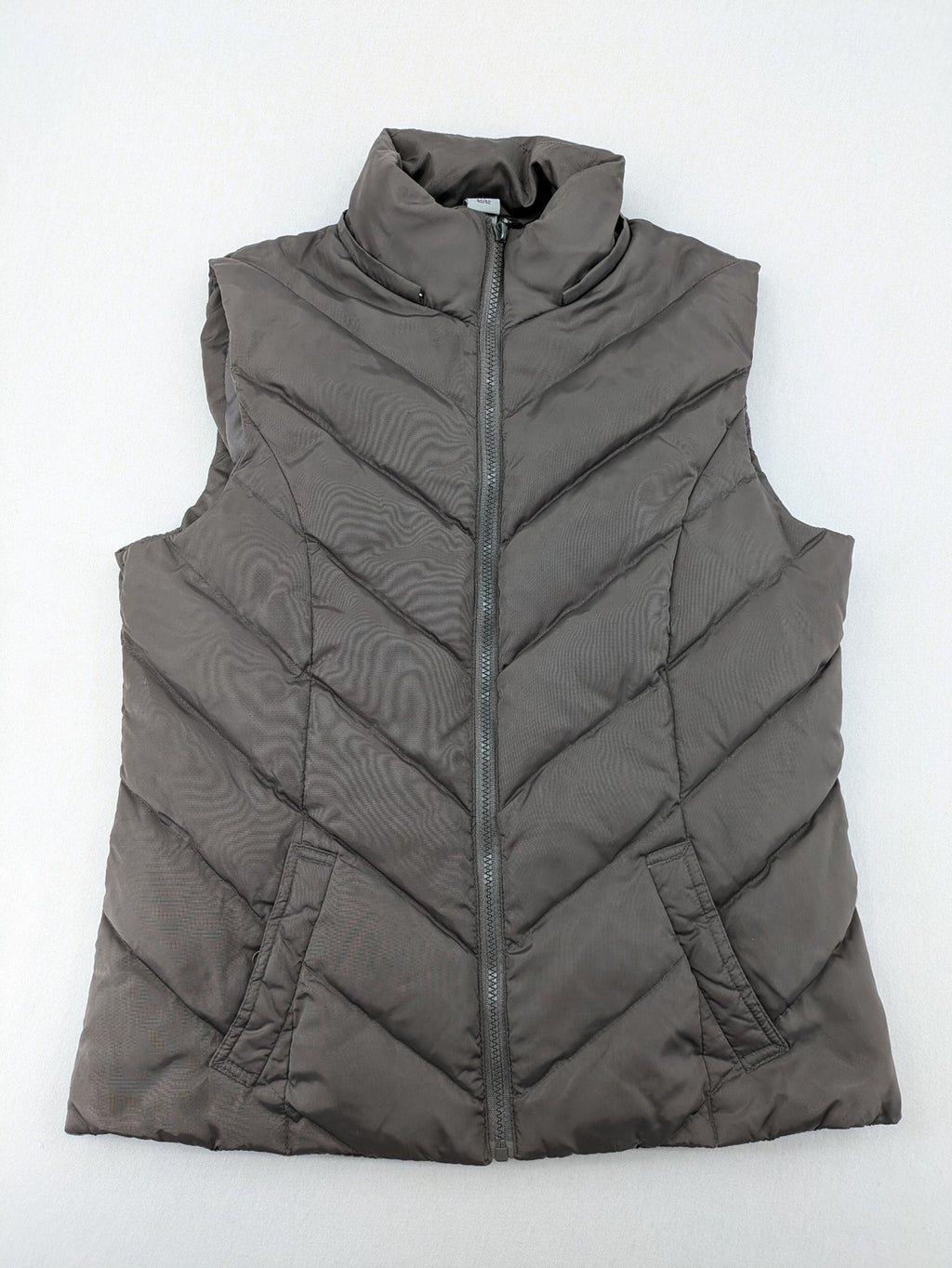 L&A Fashion grey puffer vest with zip closure, stand collar, and side pockets.
