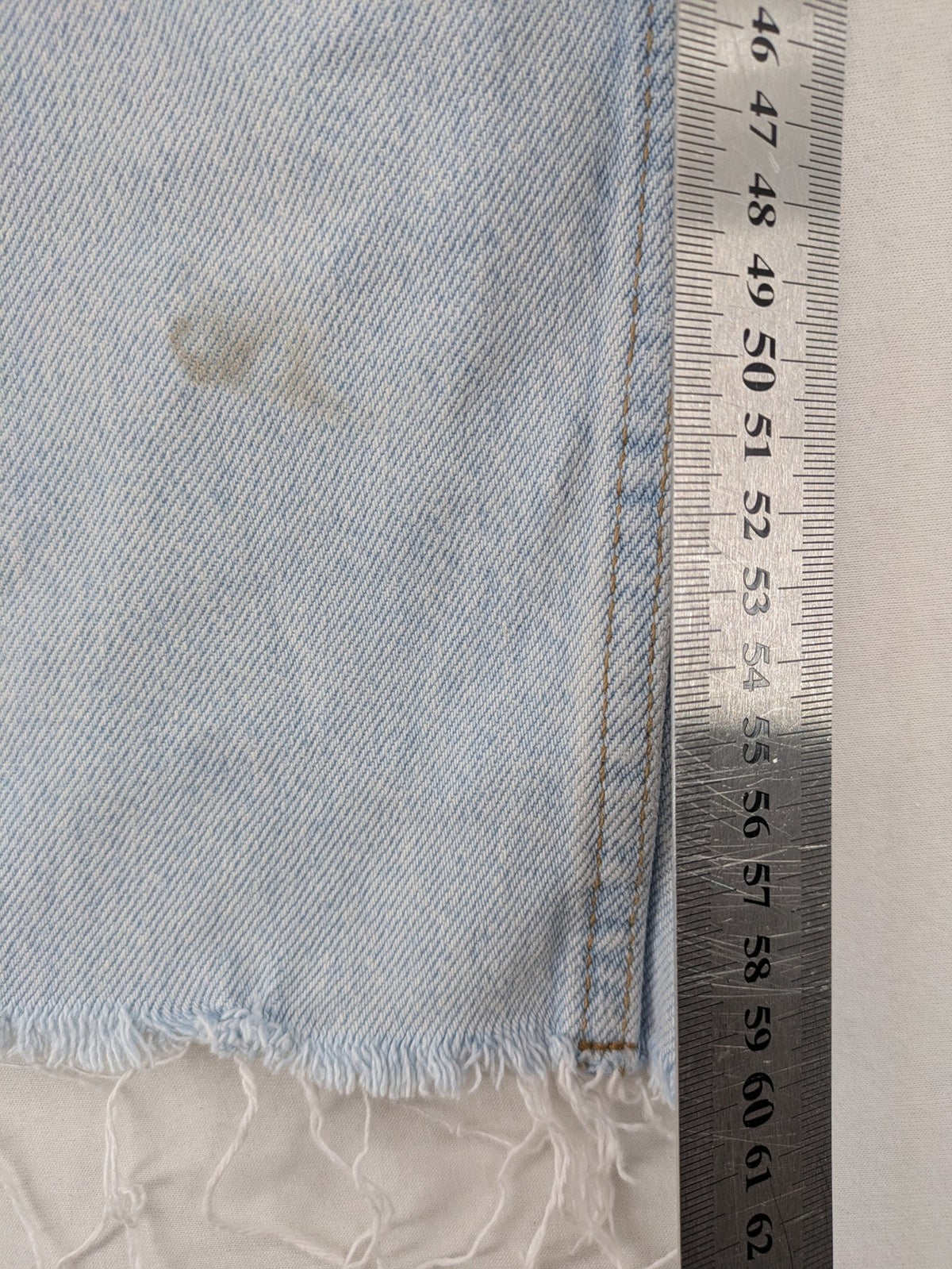 MNG blue high waist mom jeans with raw hem and five-pocket style.