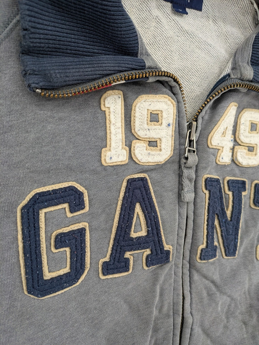 GANT multi turtle neck jumper with large 1949 logo and ribbed collar.