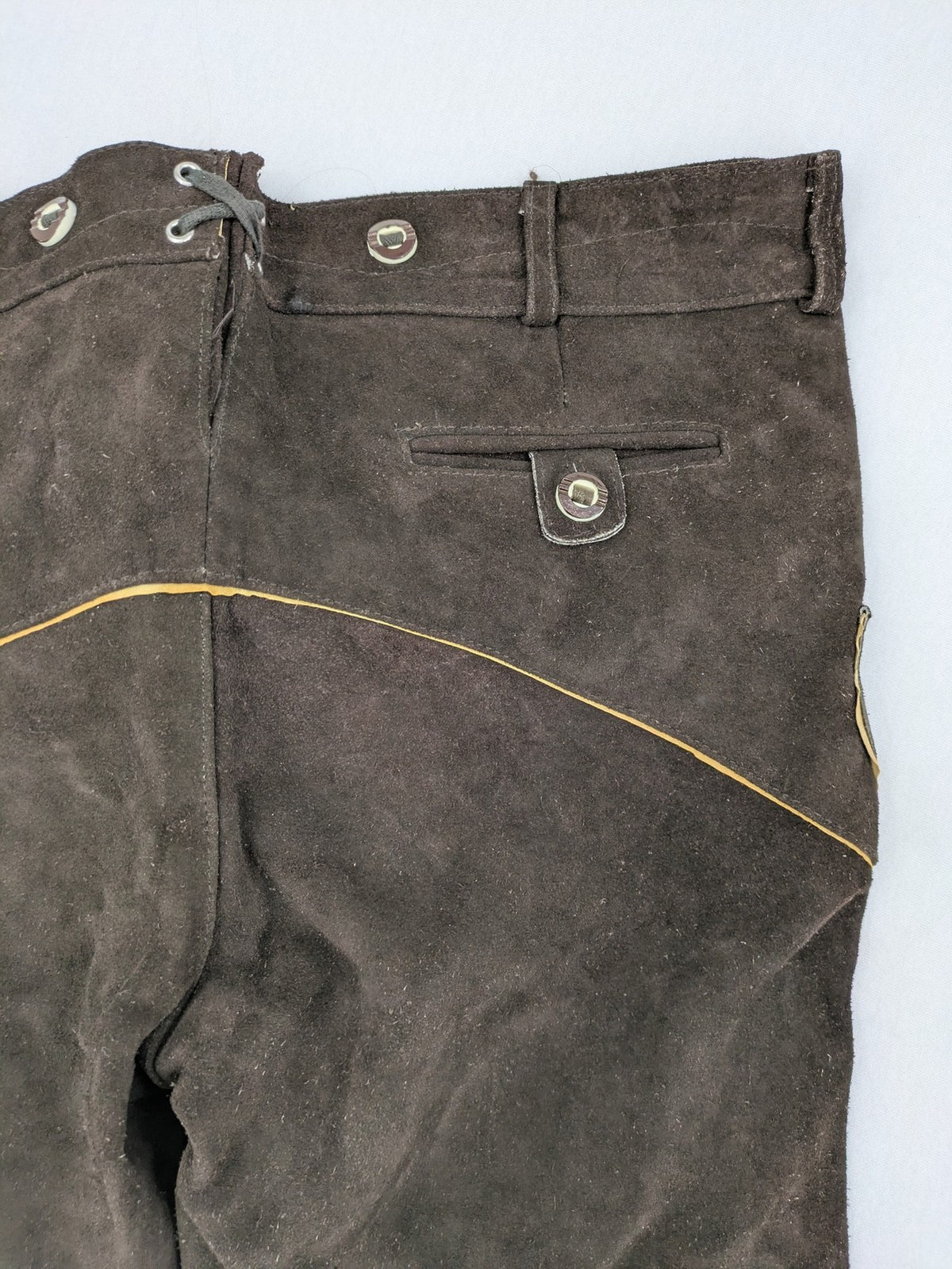 Braun traditional leather pants brown suede with intricate embroidery on bib and legs.