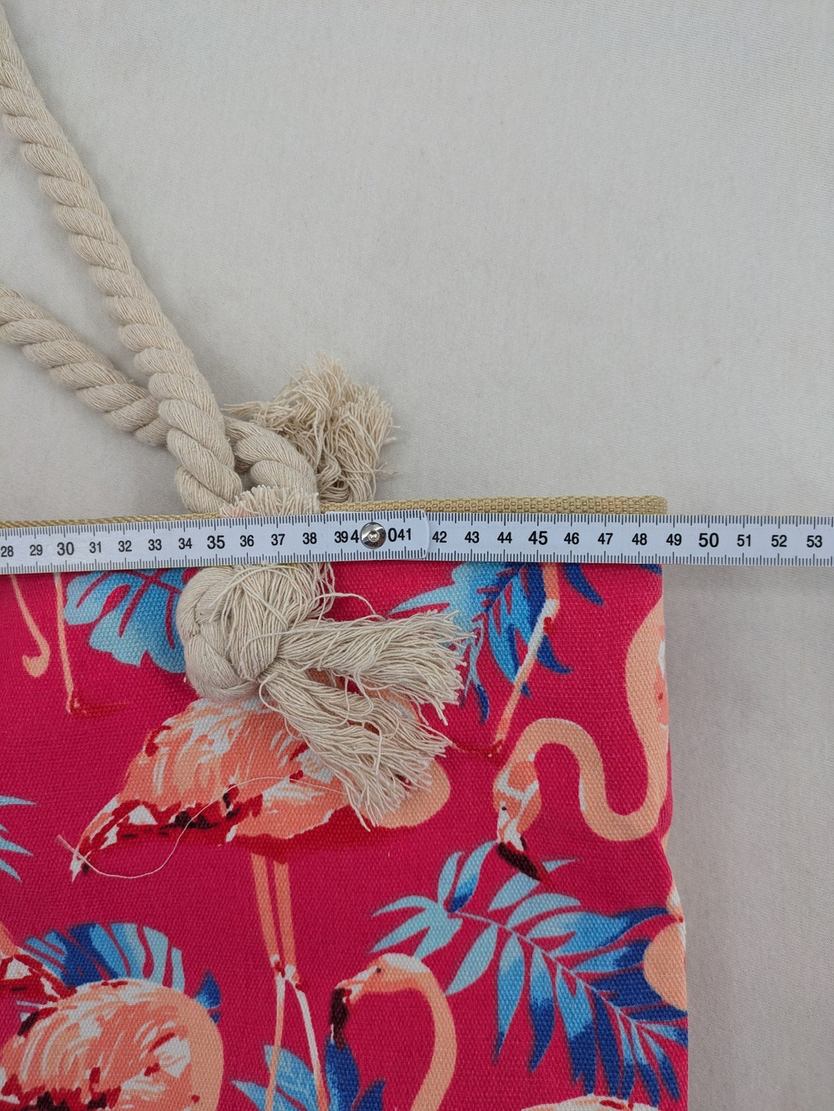 Flamingo pink shopping tote with vibrant tropical flamingo and palm leaf pattern.