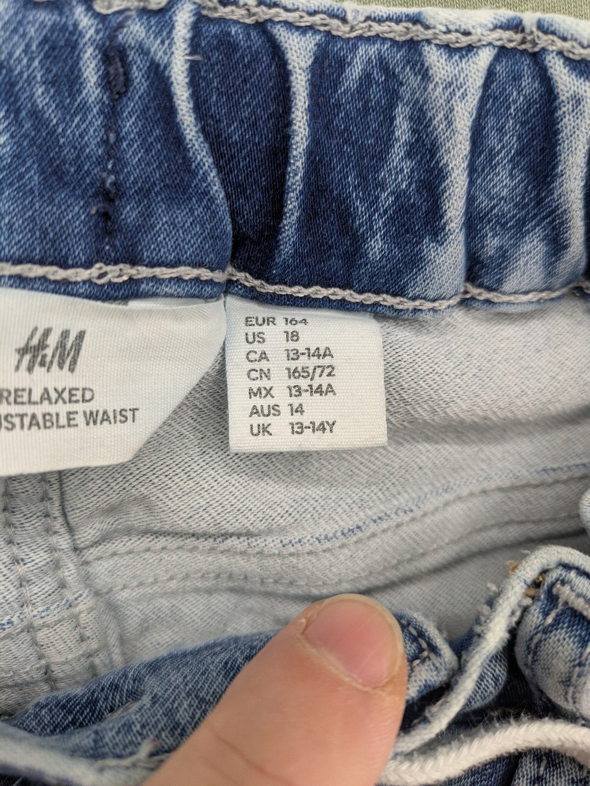 H&M blue straight jeans relaxed fit with adjustable elastic waistband and drawstring.