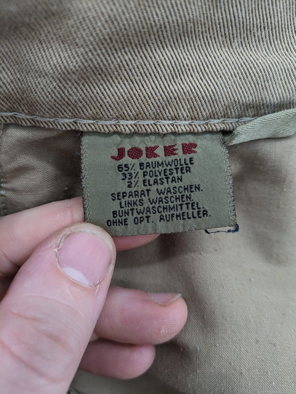 Joker beige straight jeans with double saddle stitching and classic 5-pocket design.