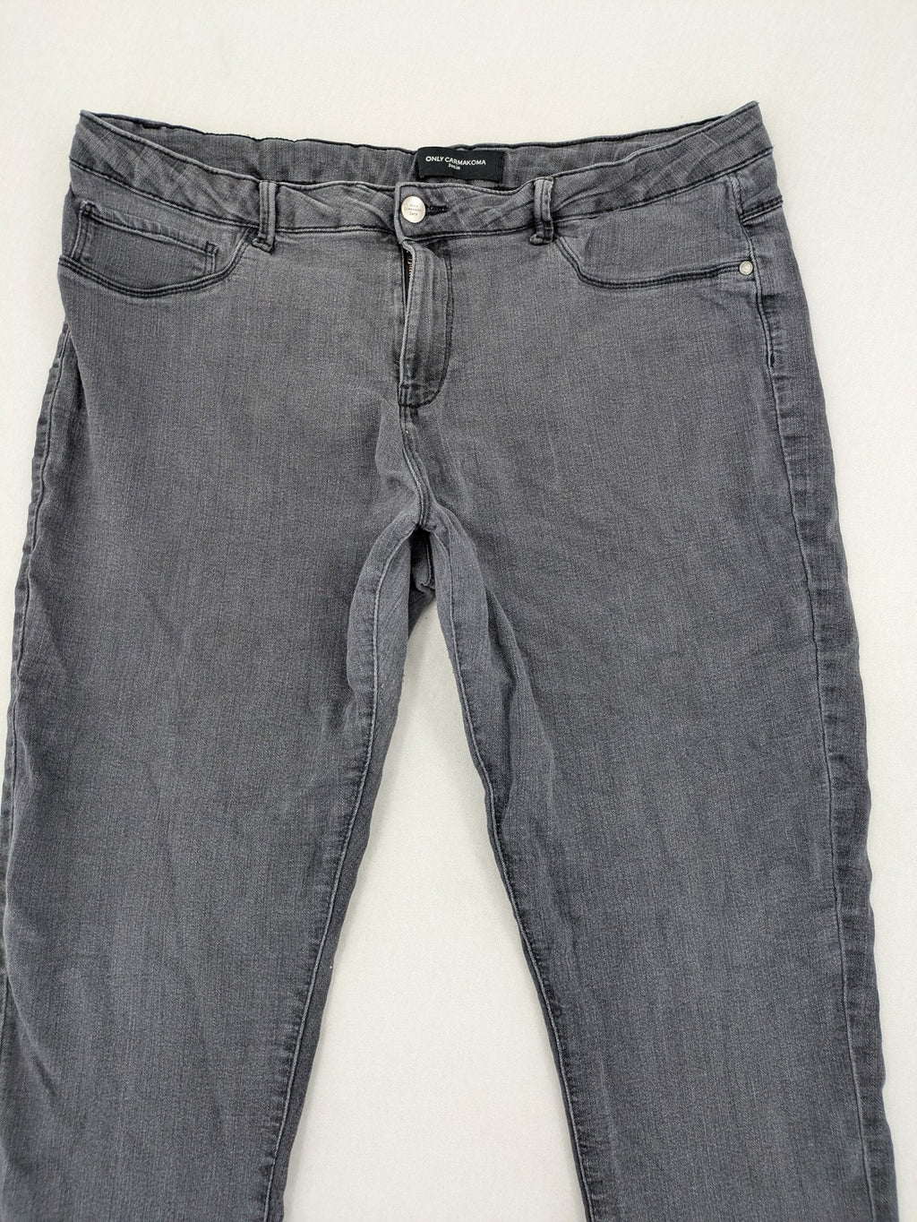 ONLY Carmakoma grey skinny fit jeans with subtle washed look and stretch denim material.