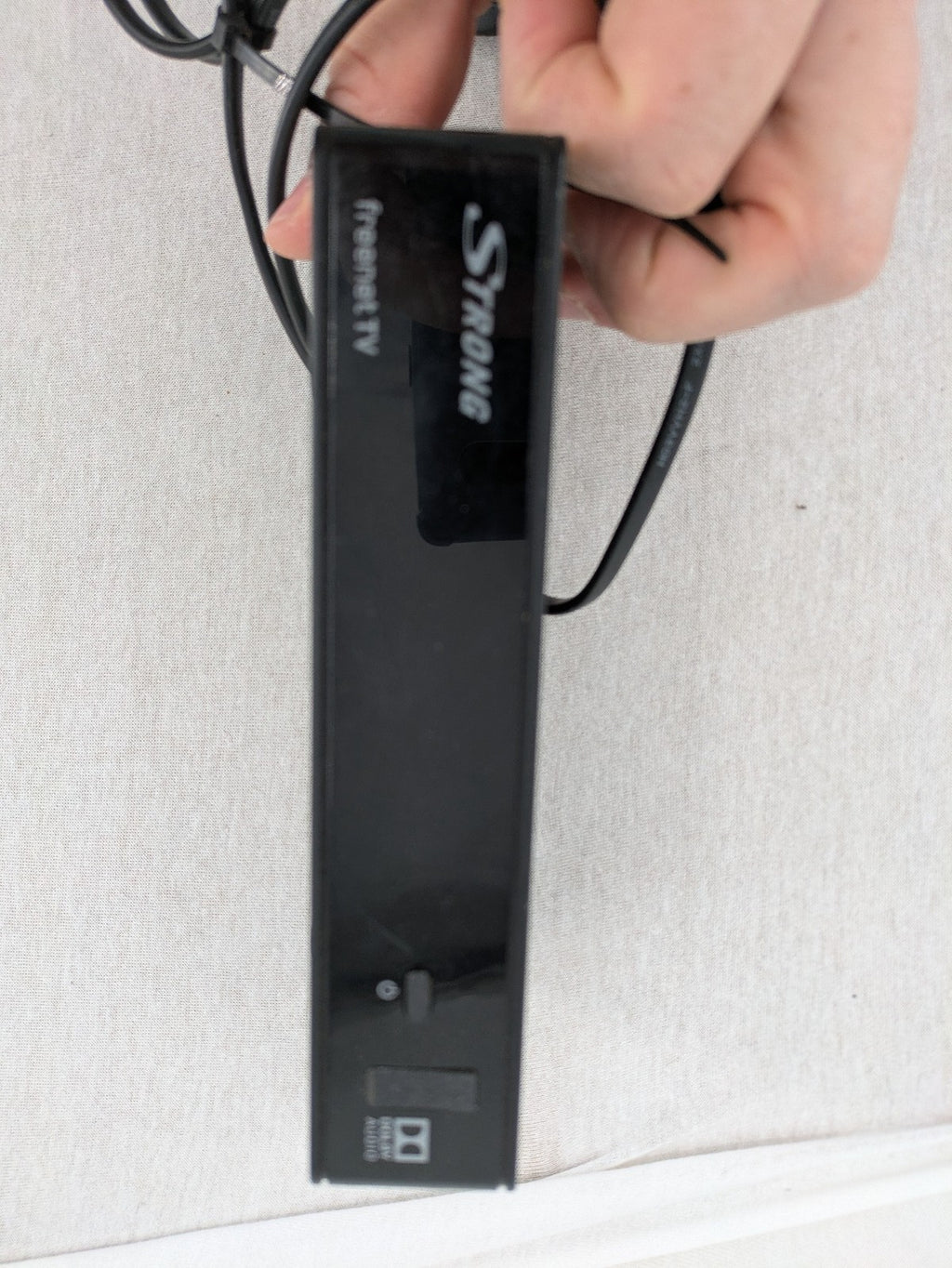 Strong satellite receiver black with logo, HDMI and SCART ports, complete antenna set.