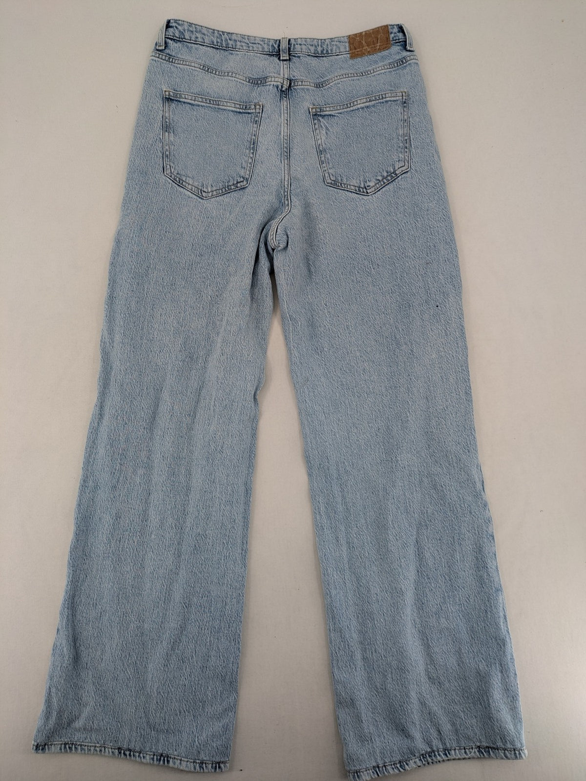 Vero Moda blue wide leg high waist jeans, classic 5-pocket design, washed denim.