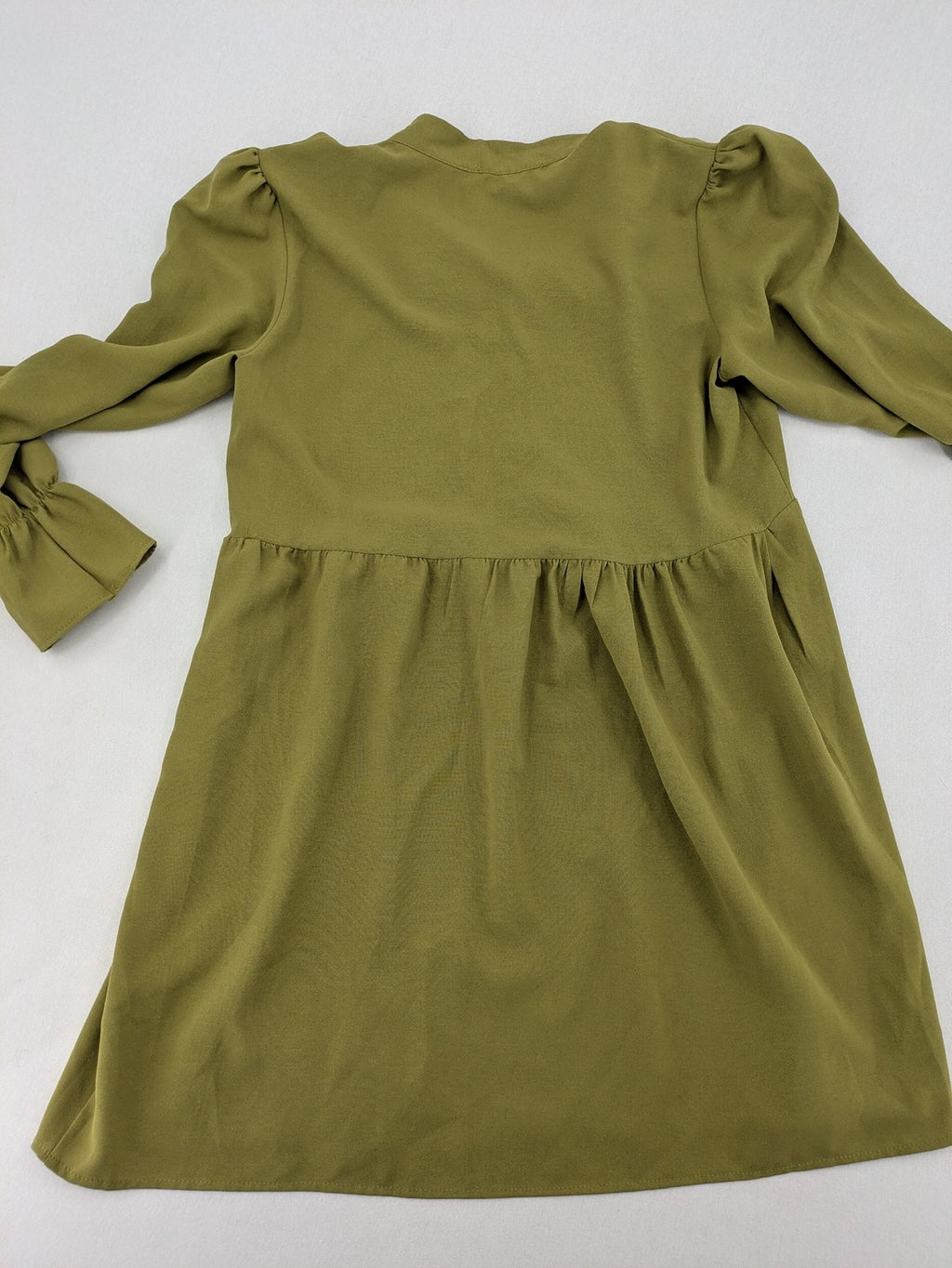 Buqre Store khaki A-line dress with puff sleeves, ruffled cuffs, and button placket.