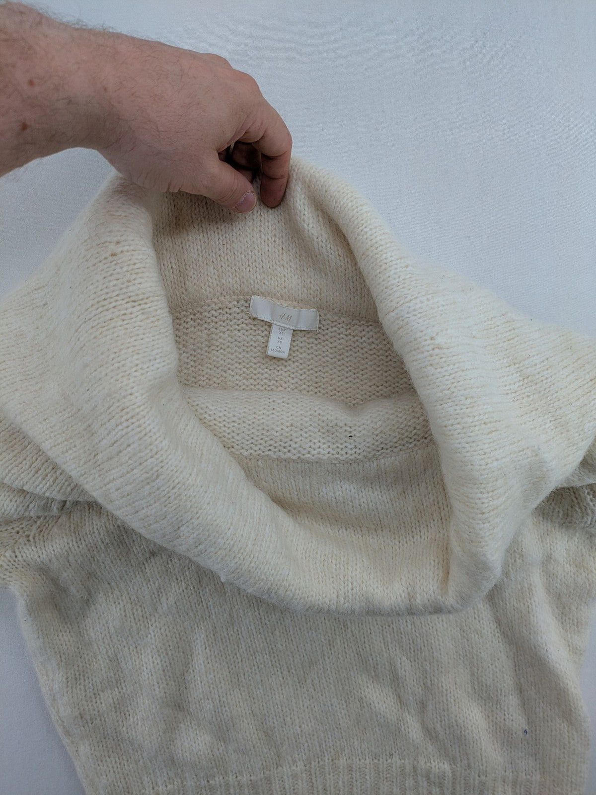 H&M beige turtle neck jumper soft alpaca blend off-shoulder design with wide collar.