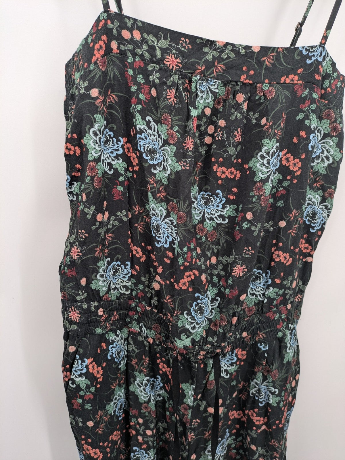 edc multi jumpsuit floral pattern sleeveless with smocked waist and spaghetti straps