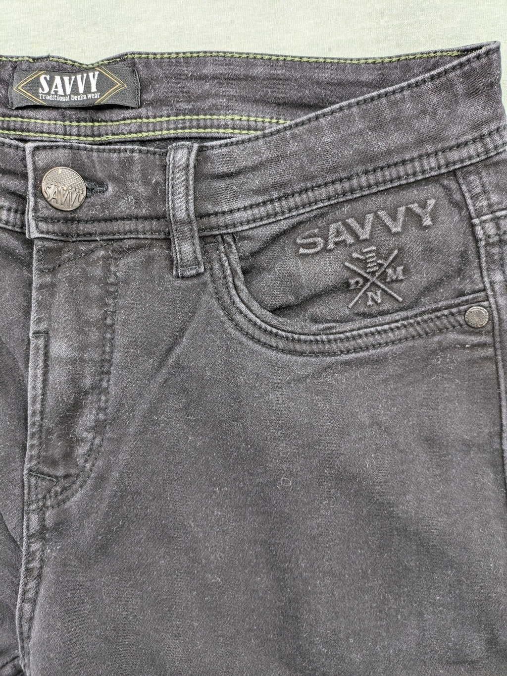 Savvy black straight jeans with washed finish and slim fit, made from stretch denim.