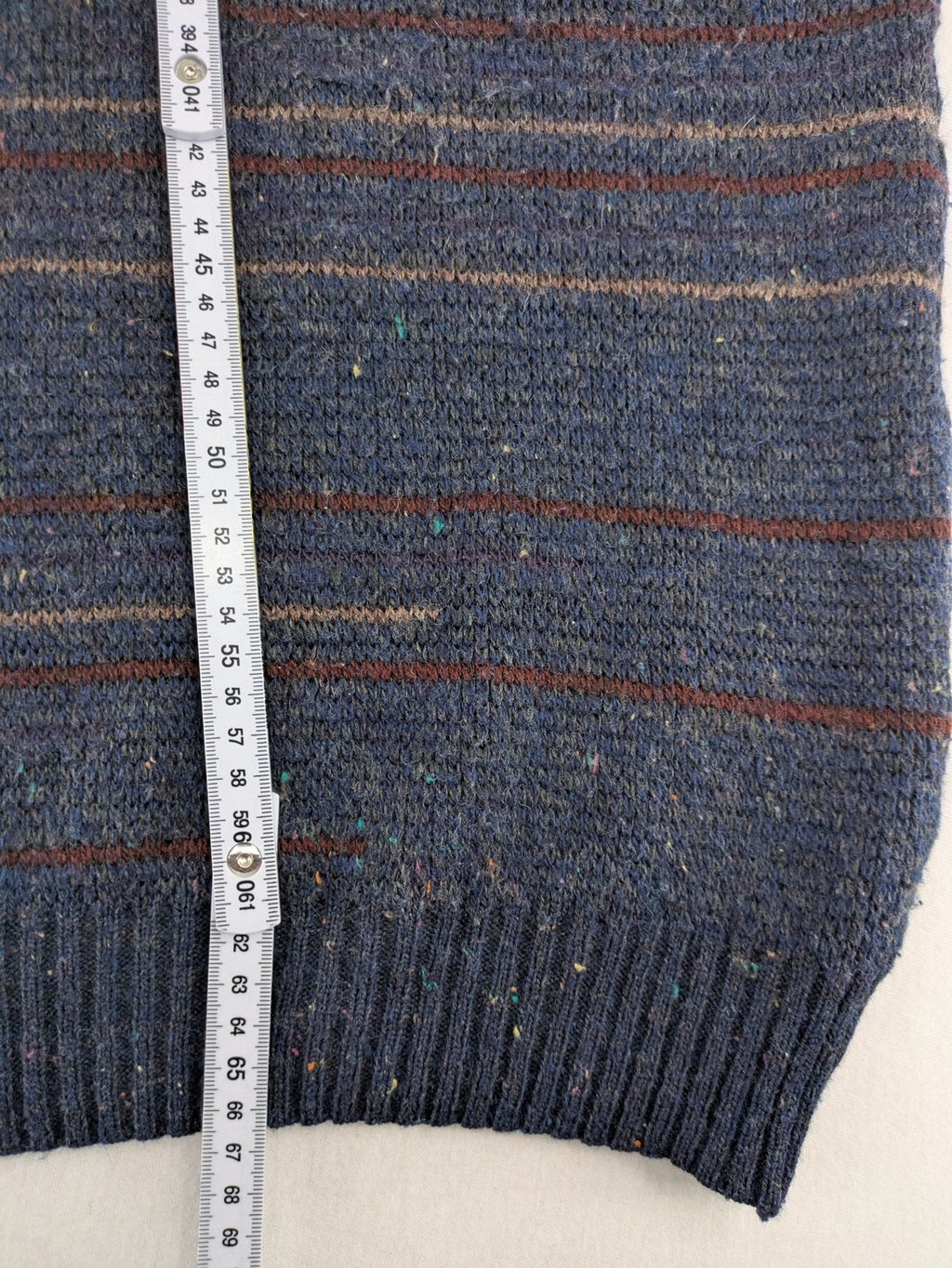 Angelo Litrico blue vest with V-neck, striped pattern, and textured melange design.