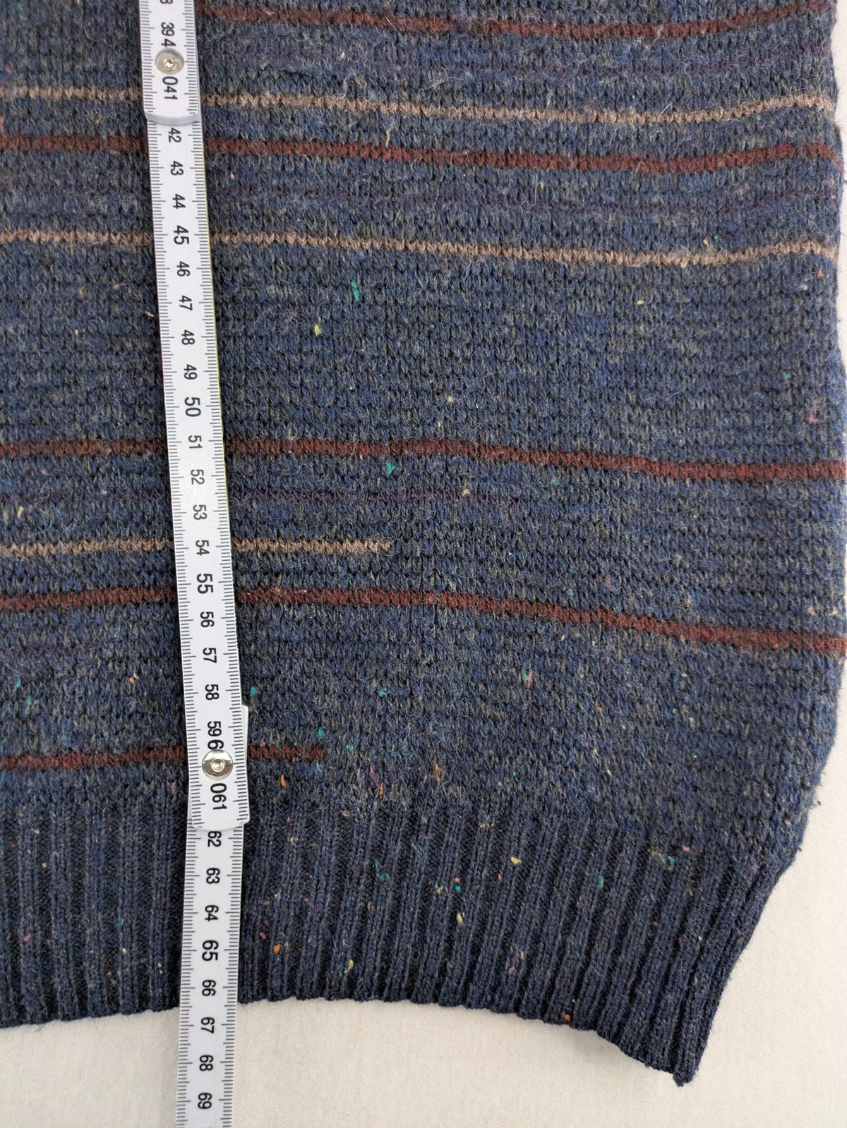 Angelo Litrico blue vest with V-neck, striped pattern, and textured melange design.