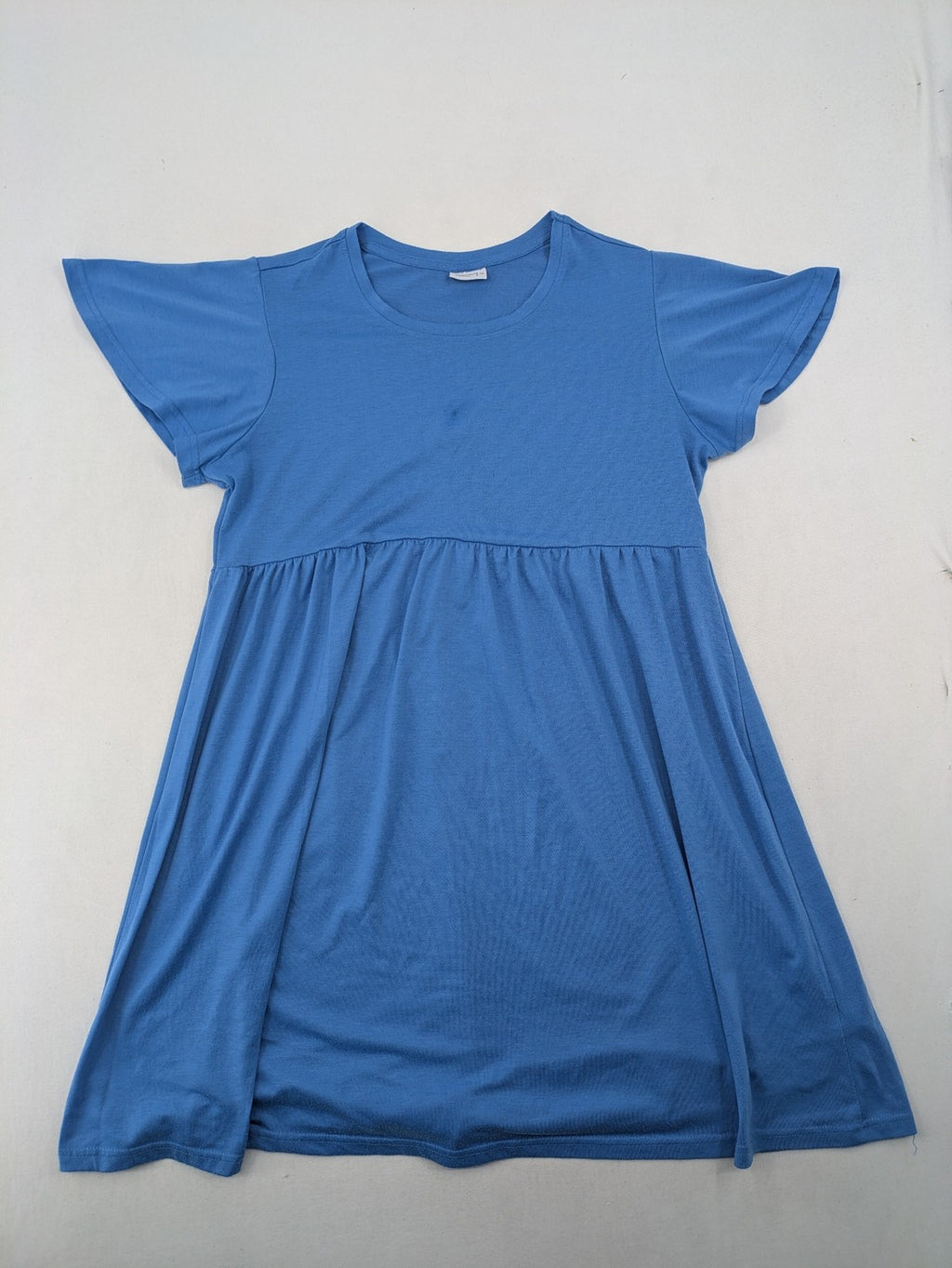 Infinity blue T-shirt dress A-line cut with playful flutter sleeves and soft stretch fabric.