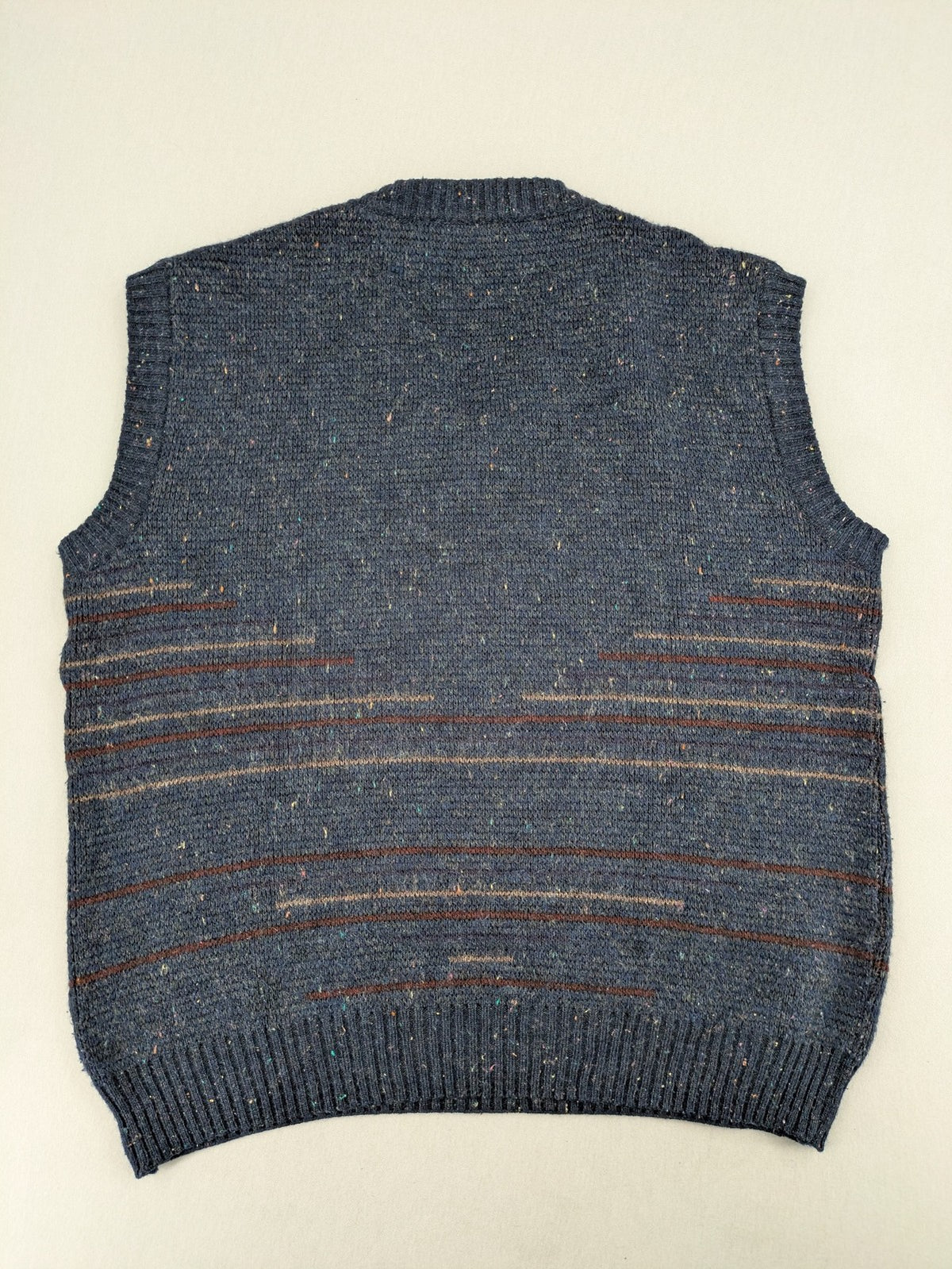 Angelo Litrico blue vest with V-neck, striped pattern, and textured melange design.
