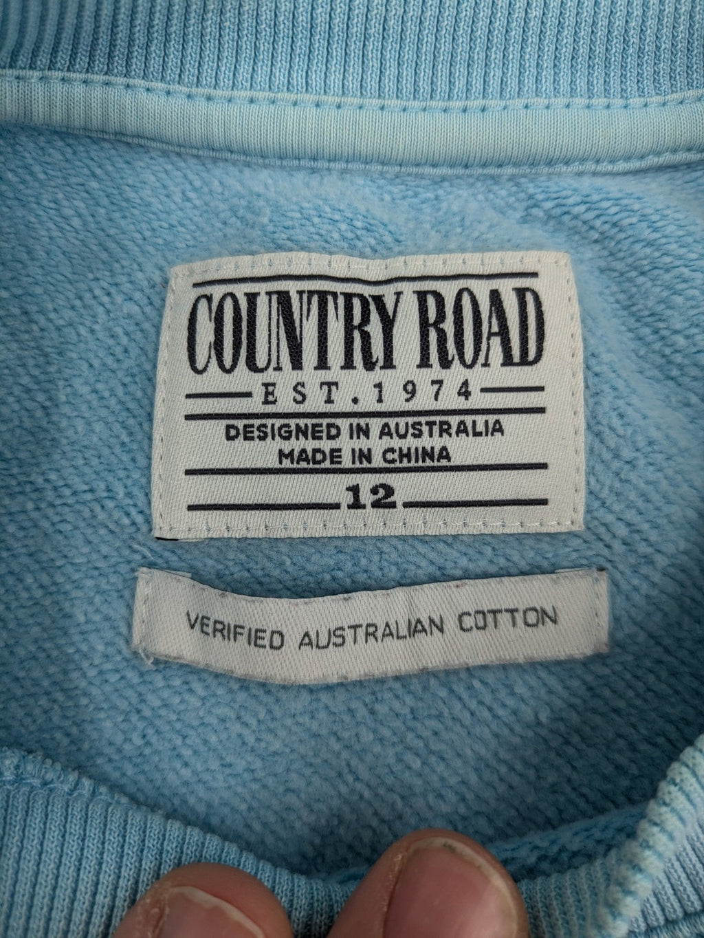 Country Road blue turtle neck jumper with embossed logo on chest, made from cotton.