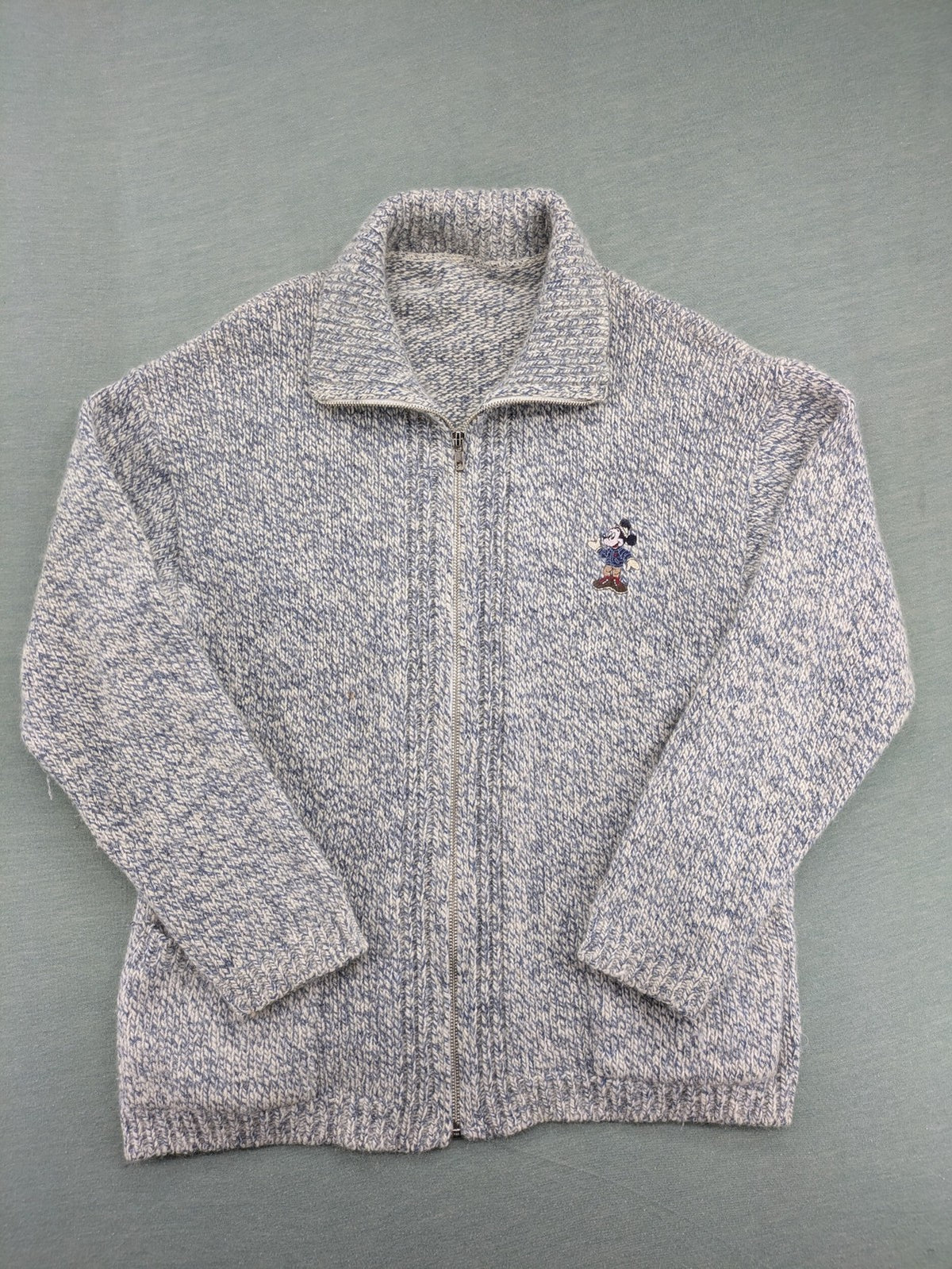 Disney blue turtle neck jumper with grey Mickey and Minnie Mouse embroidery, zip closure.
