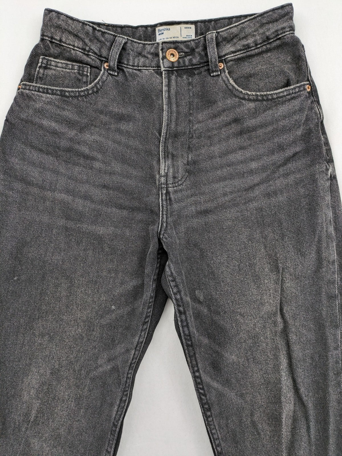 Bershka black mom jeans high-waist straight leg washed denim with classic five-pocket design.