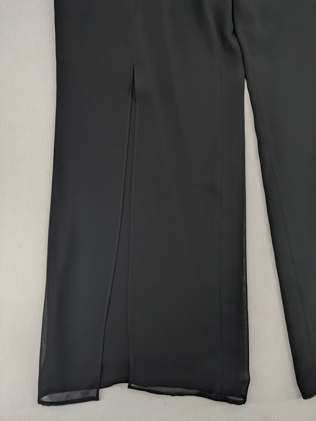 Gerry Weber grey palazzo pants with chiffon overlay and front slits.