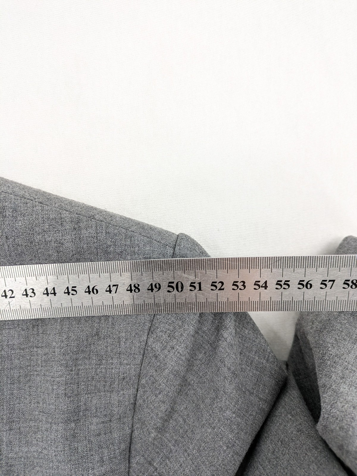 Montego grey blazer three-button design made from wool blend with smooth lining.