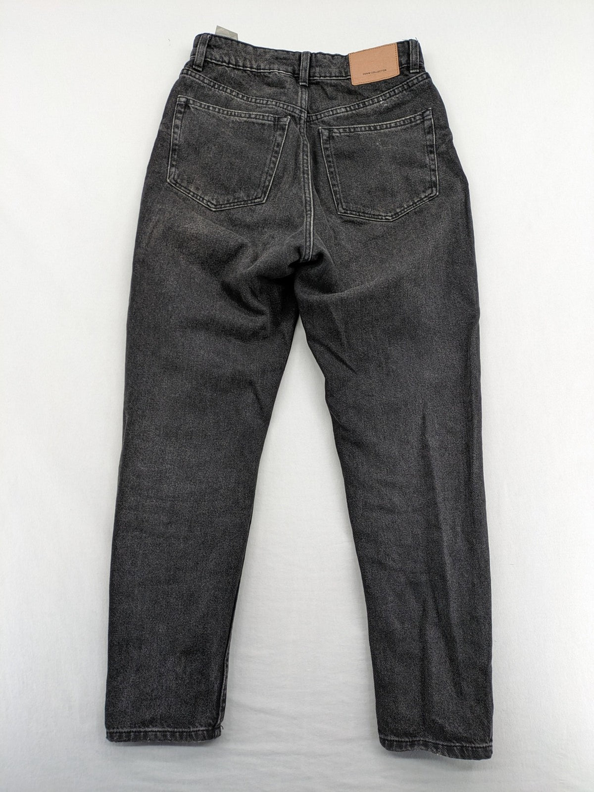 Bershka black mom jeans high-waist straight leg washed denim with classic five-pocket design.