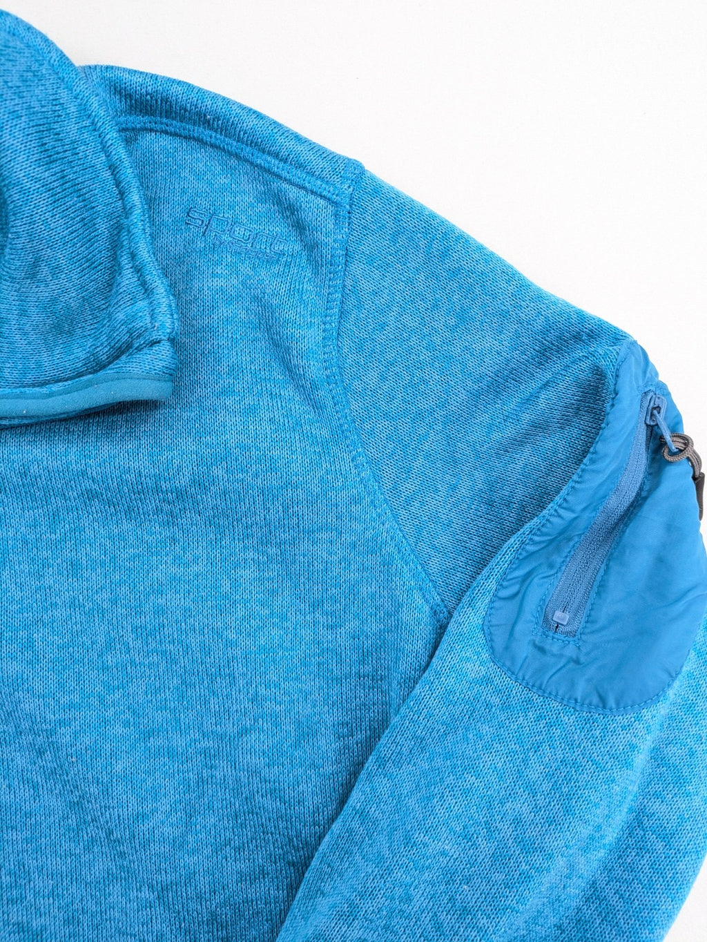 Stooker blue and turquoise fleece jacket with full zip and stand-up collar.