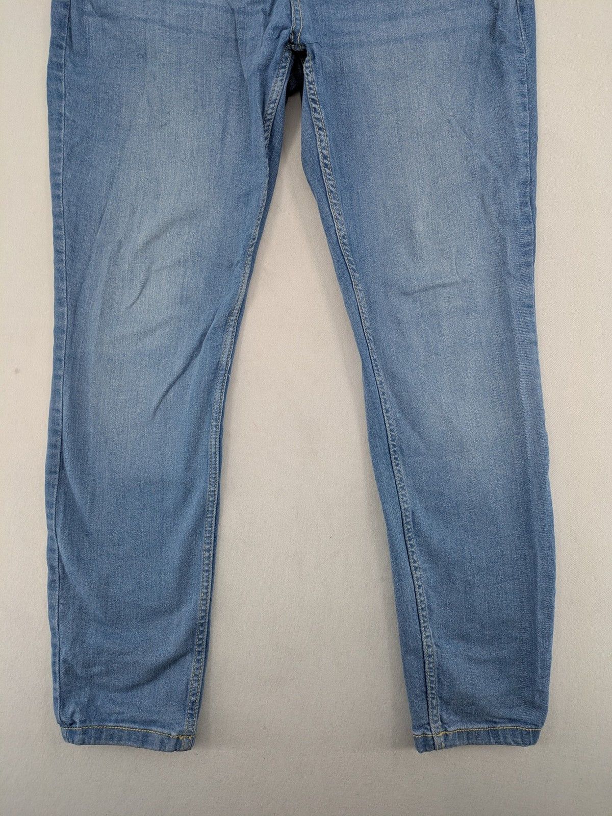 Janina blue skinny fit jeggings with elastic waistband and angled front pockets.