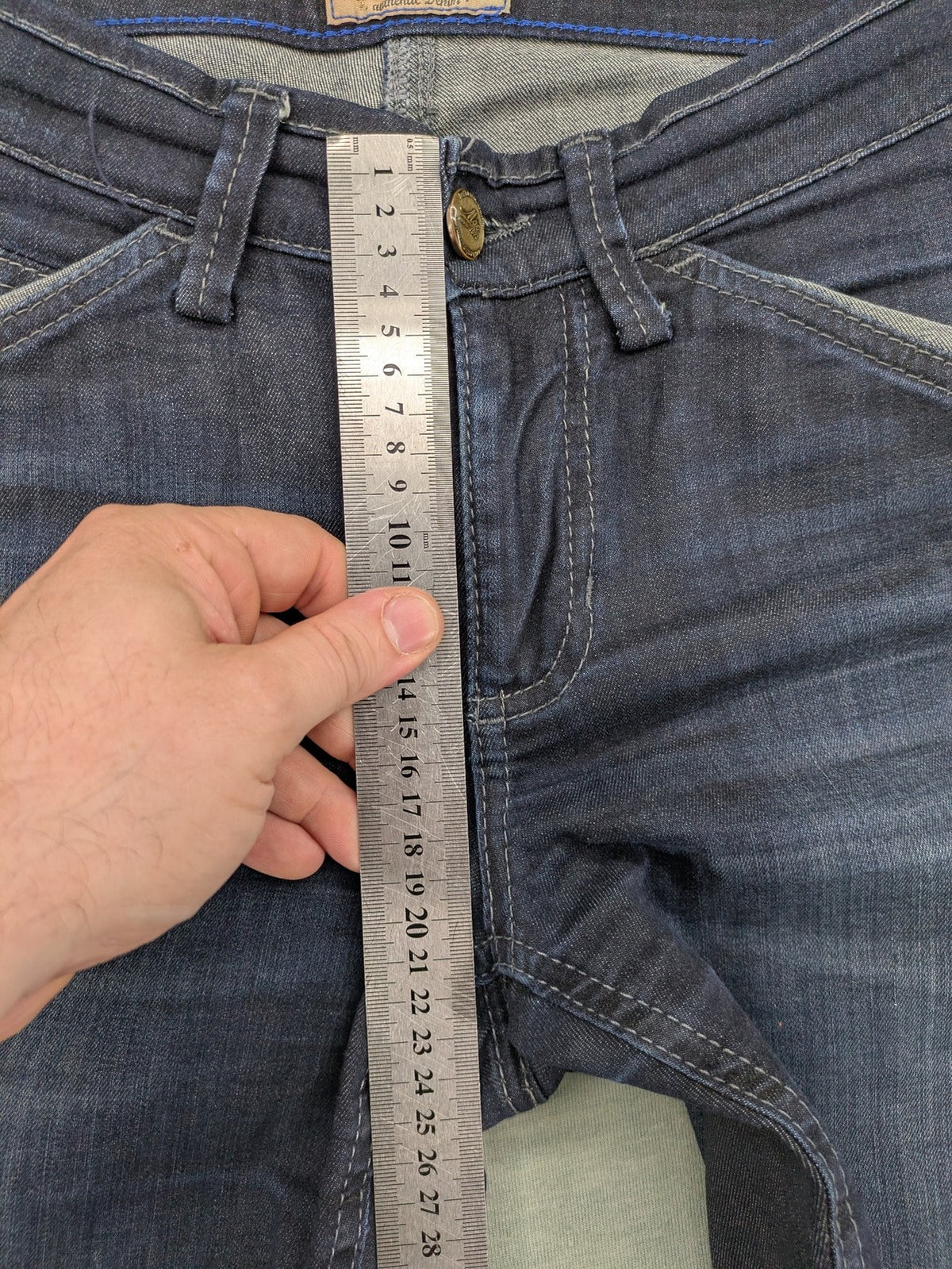 Mac Jeans blue straight jeans dark wash with subtle fading and stretch denim material.