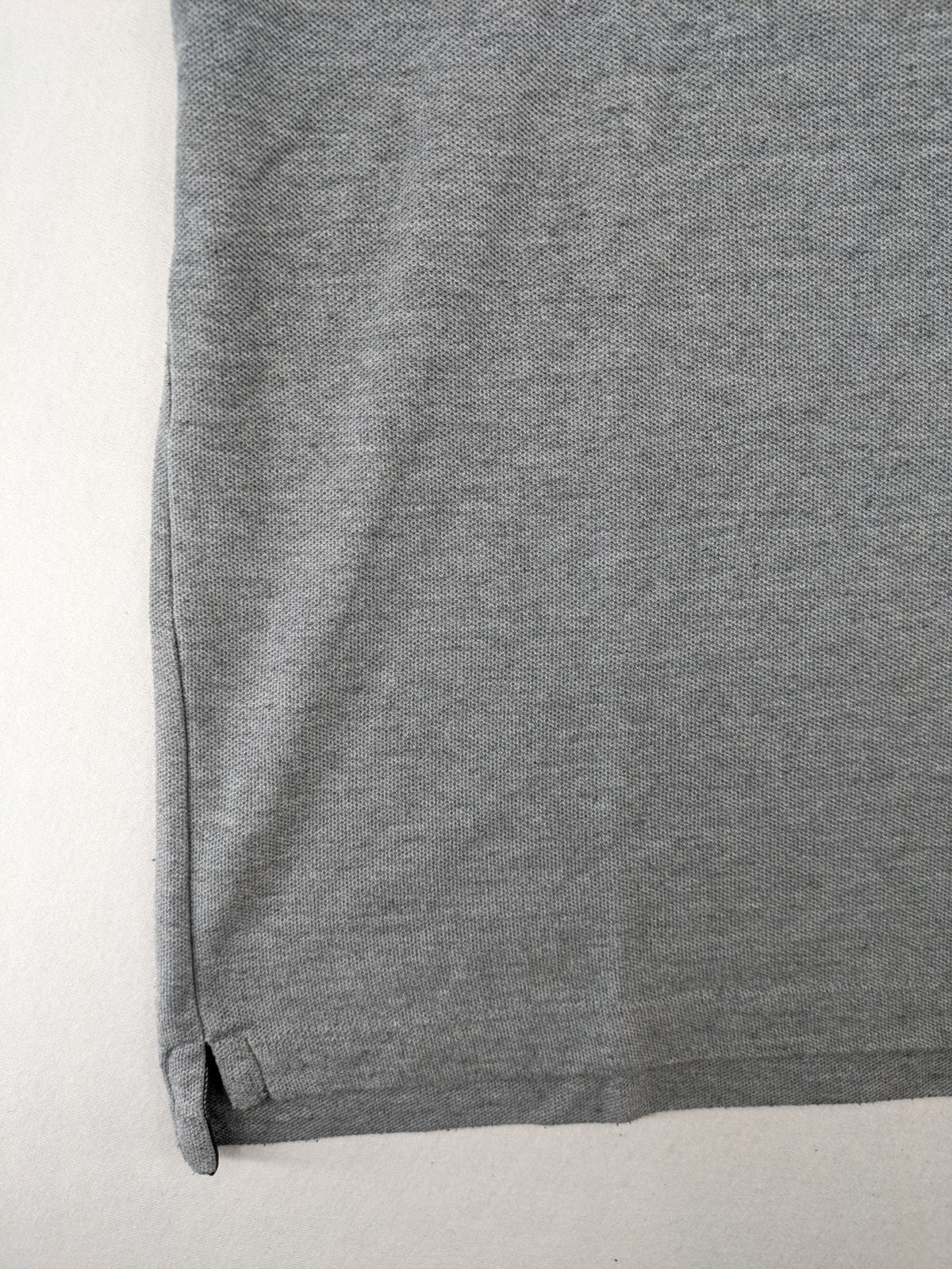 Götter & Helden grey polo shirt with "Gods Favorite" embroidery and contrasting collar details.