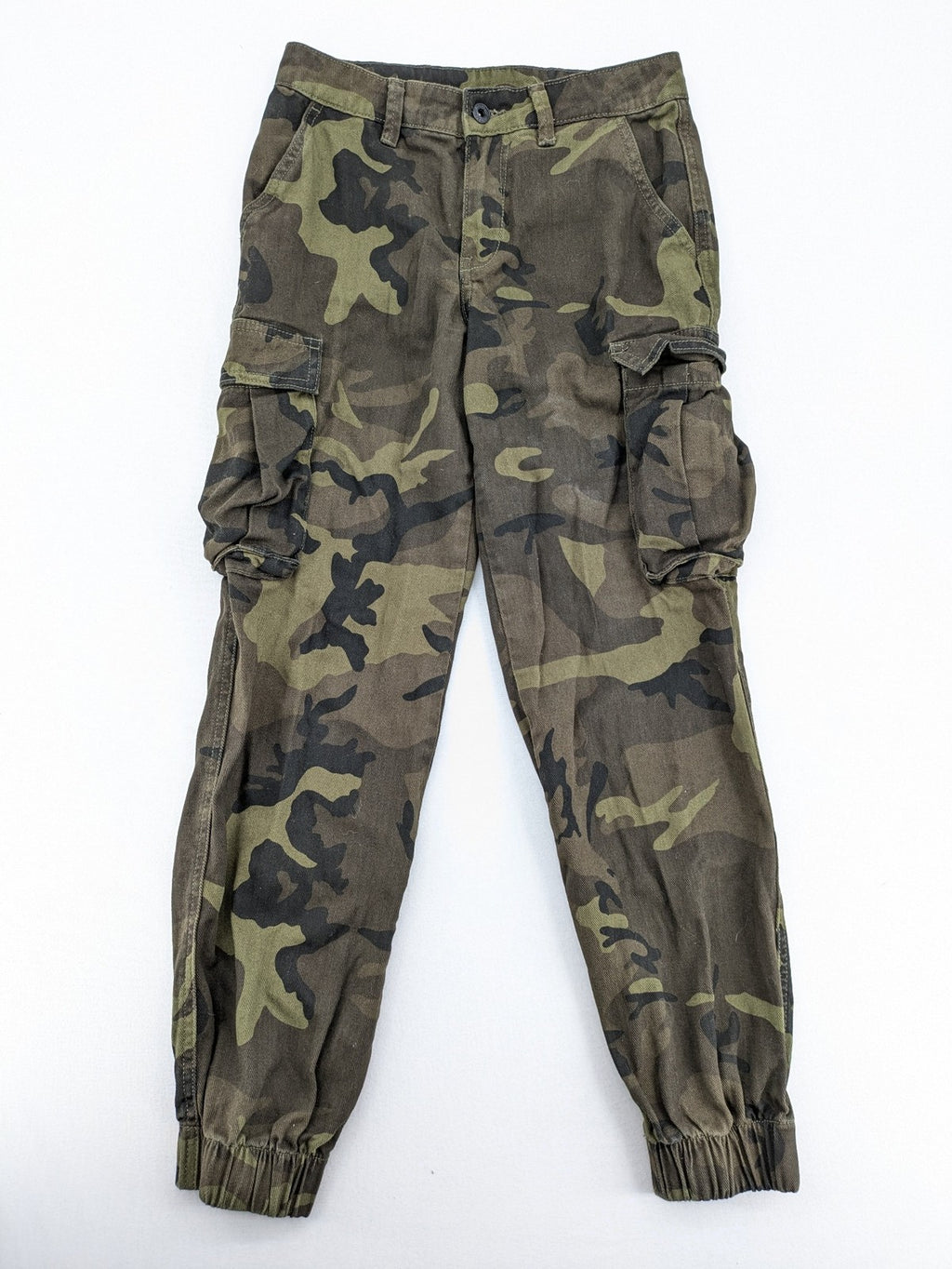Rainbow camouflage cargo pants in green-brown with jogger silhouette and multiple pockets.