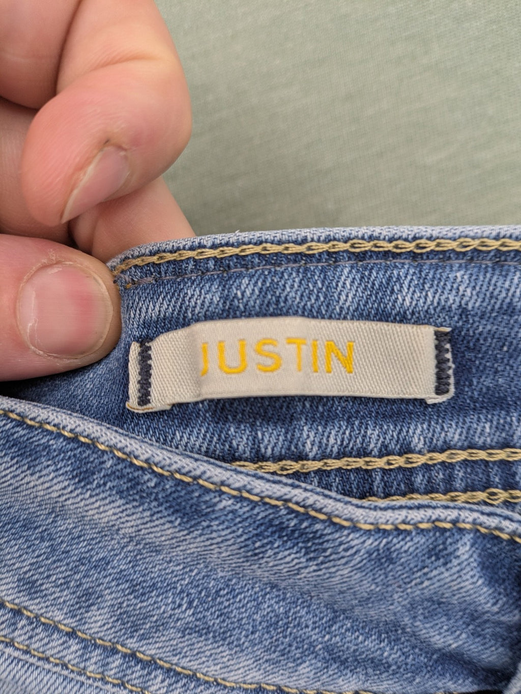 Wotega blue straight jeans light wash faded with classic 5-pocket design and stretch material.