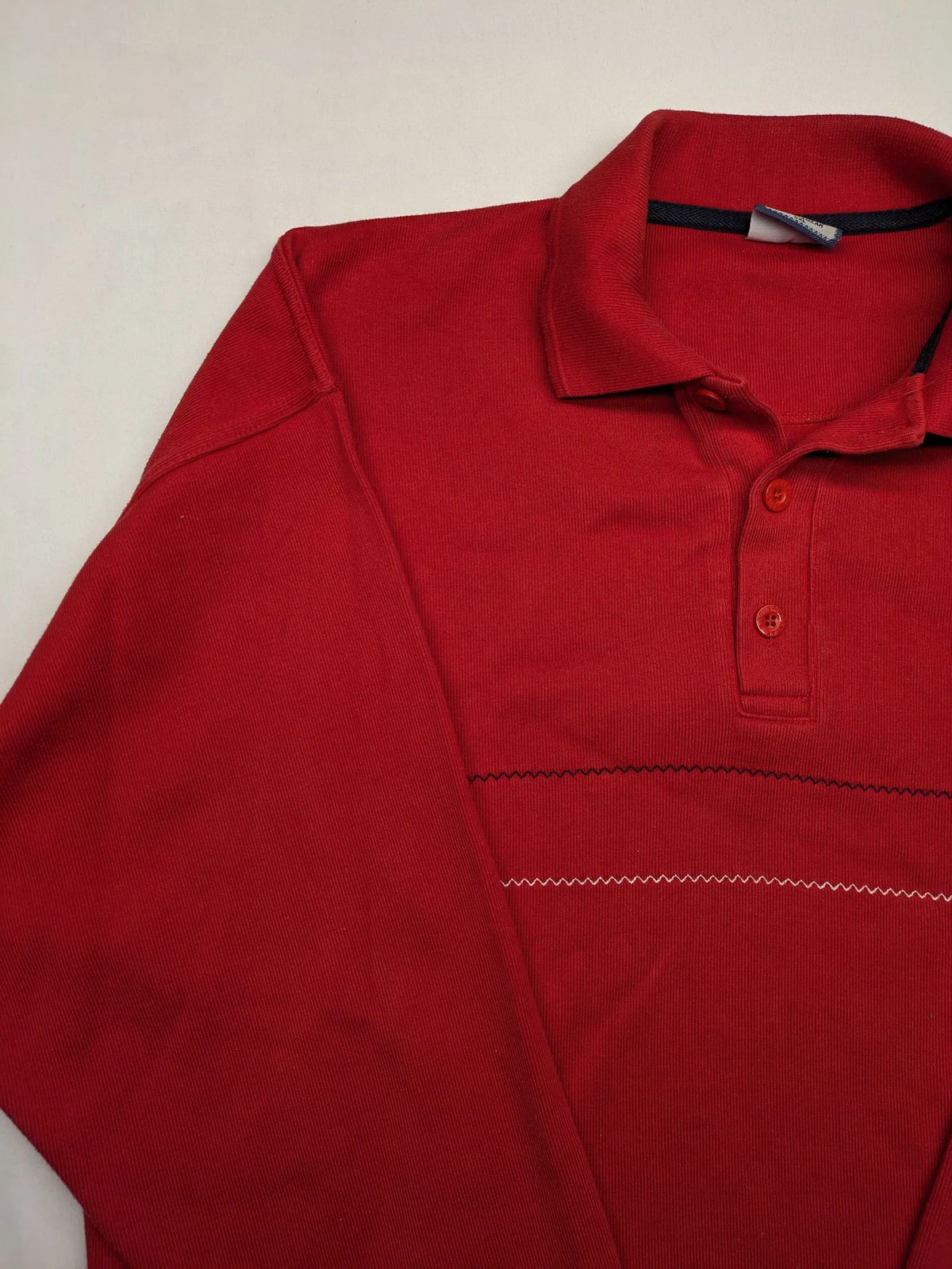 Wind Sportswear red turtle neck jumper with classic polo collar and zigzag stitching.